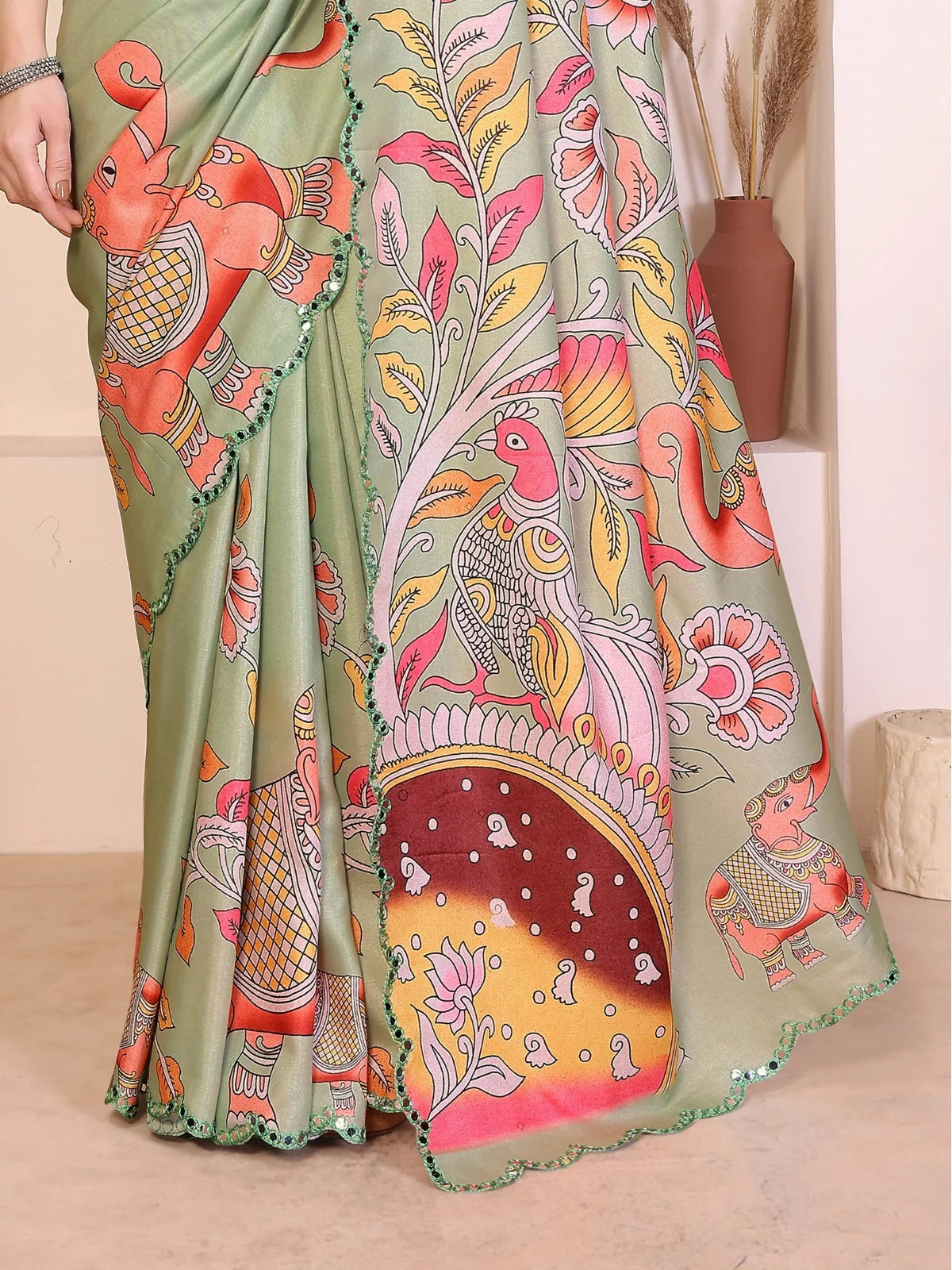Tarani green saree pallu view showing vibrant kalamkari digital print and elephant motifs