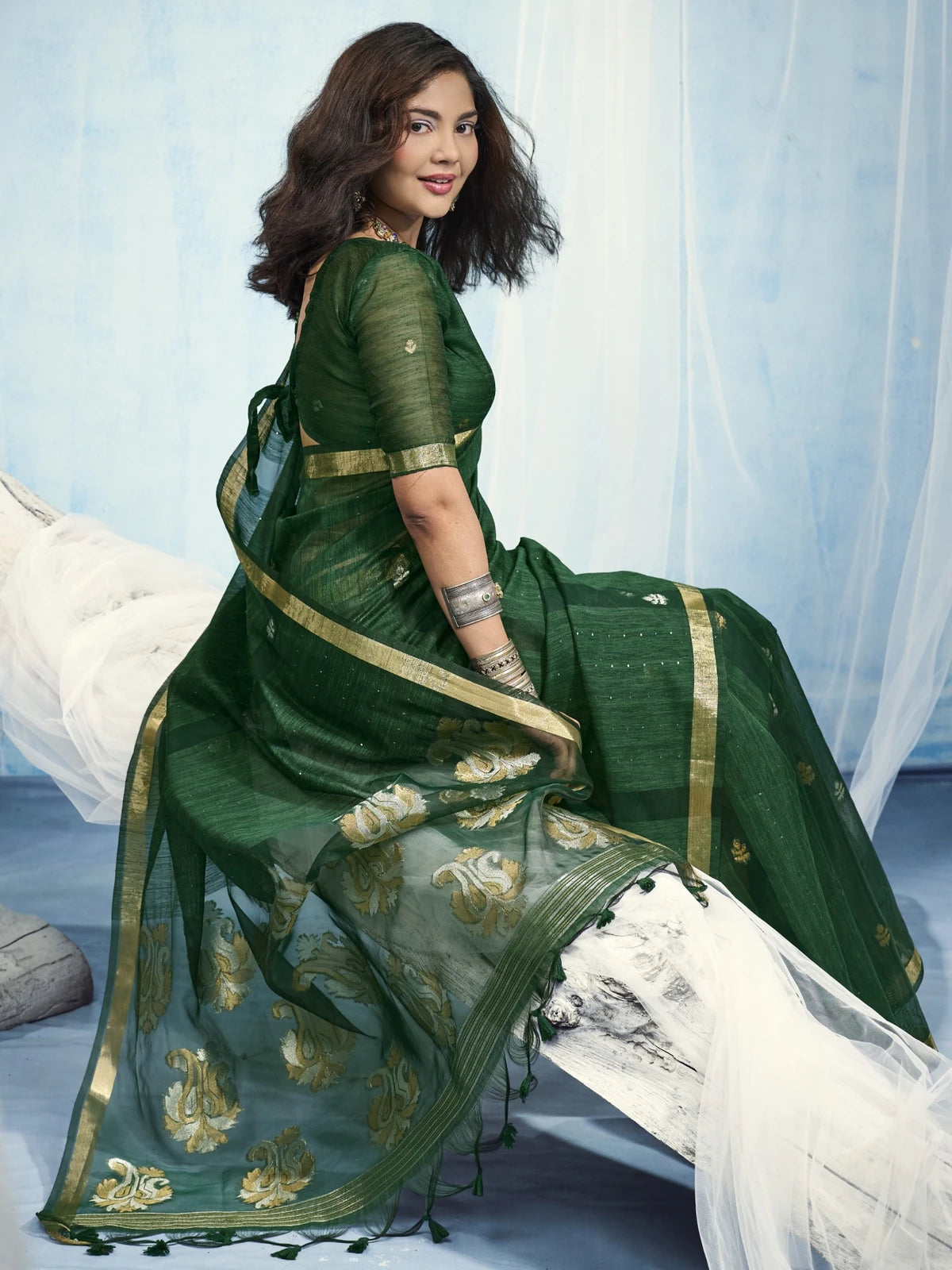 Tarani green Pure Munga Silk Handloom saree side-view with organza pallu and weaving border