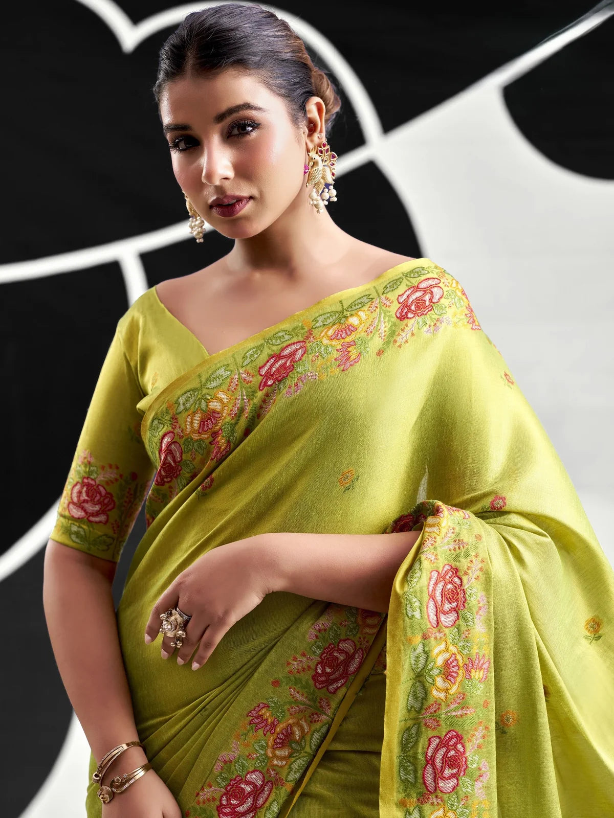 Tarani green tissue silk saree upper-body-view with floral woven border and blouse piece