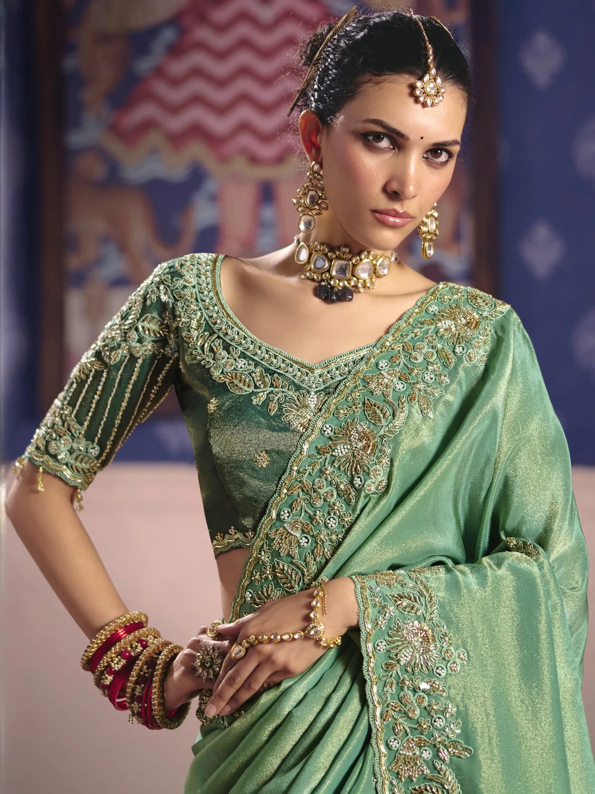 Tarani Ujwalika green saree upper body view with embroidered blouse and zari border detailing