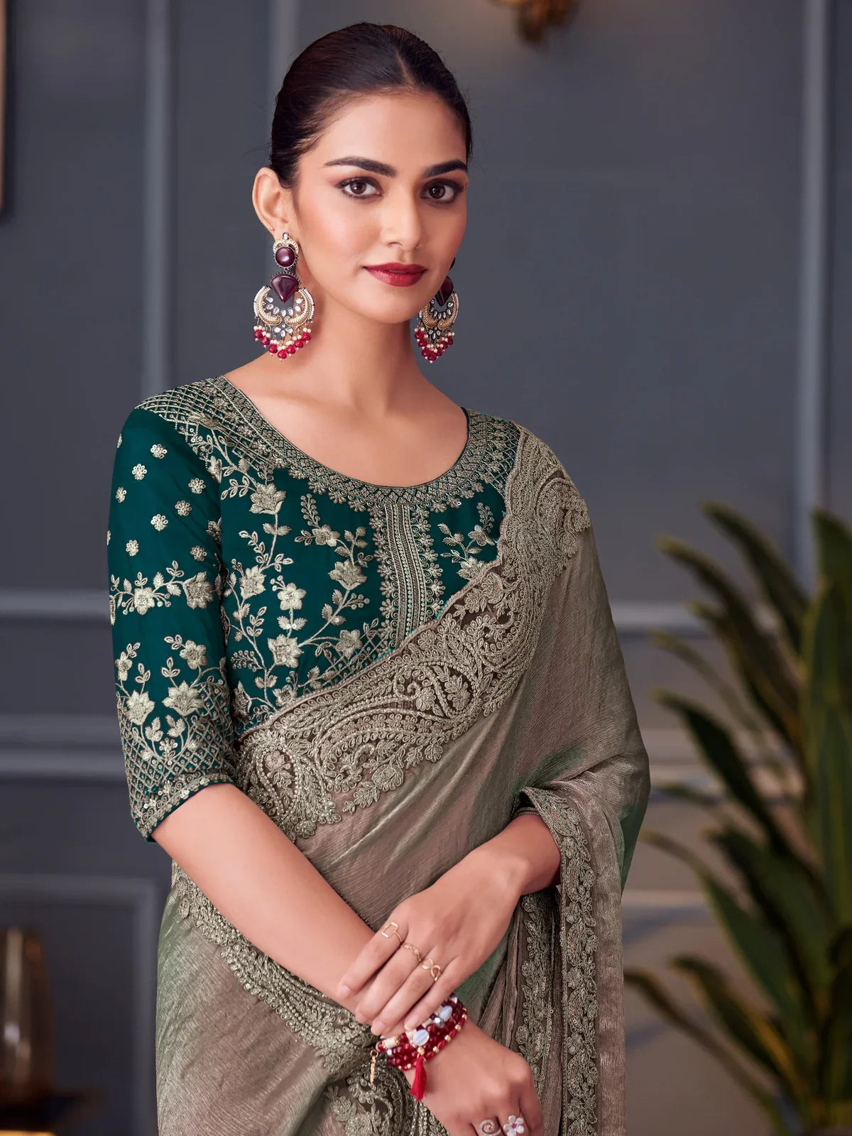 Tarani green chiffon silk saree upper body close view with embroidered georgette blouse