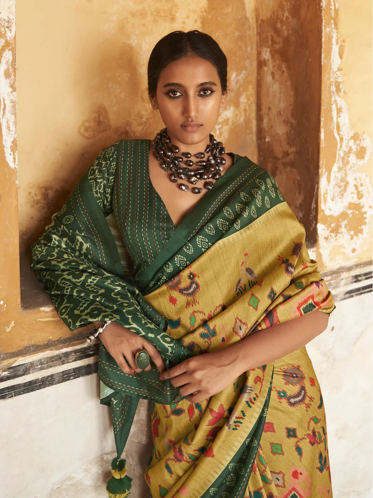Tarani green tusser silk saree upper body with kalamkari and patola pallu detailing
