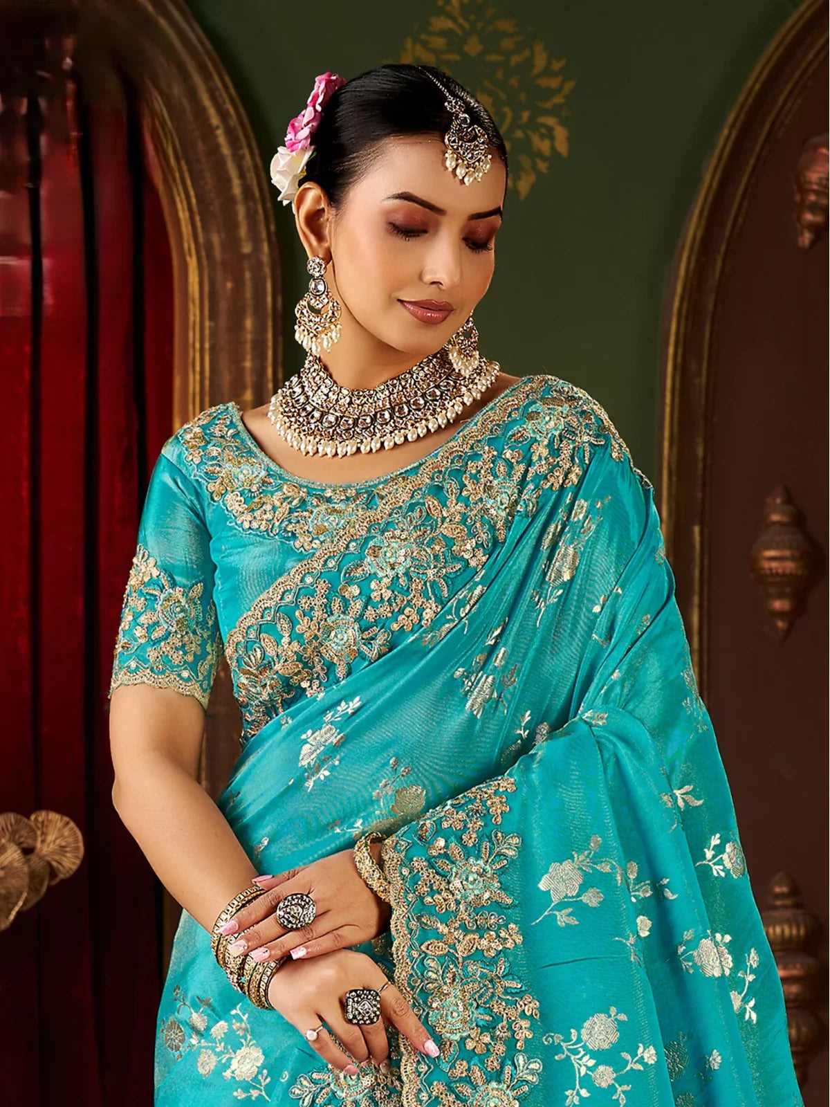 Tarani soft fancy green saree with floral embroidered designer blouse in upper body pose