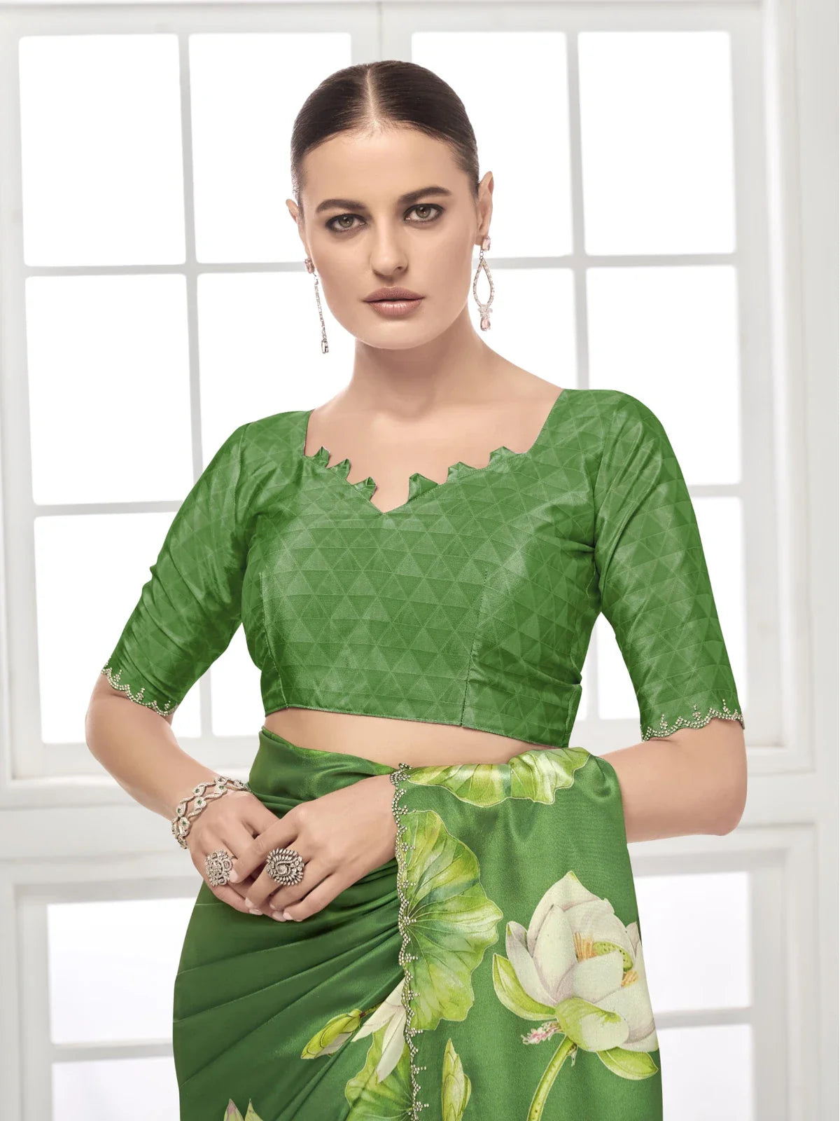 Tarani green premium silk blouse with triangle neckline and lotus saree drape upper body view