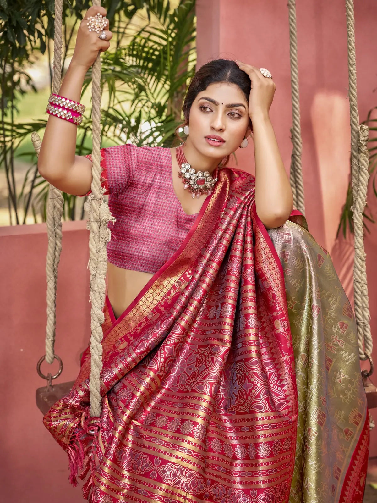 Tarani green kanjivaram silk saree upper body view with matching blouse and red border
