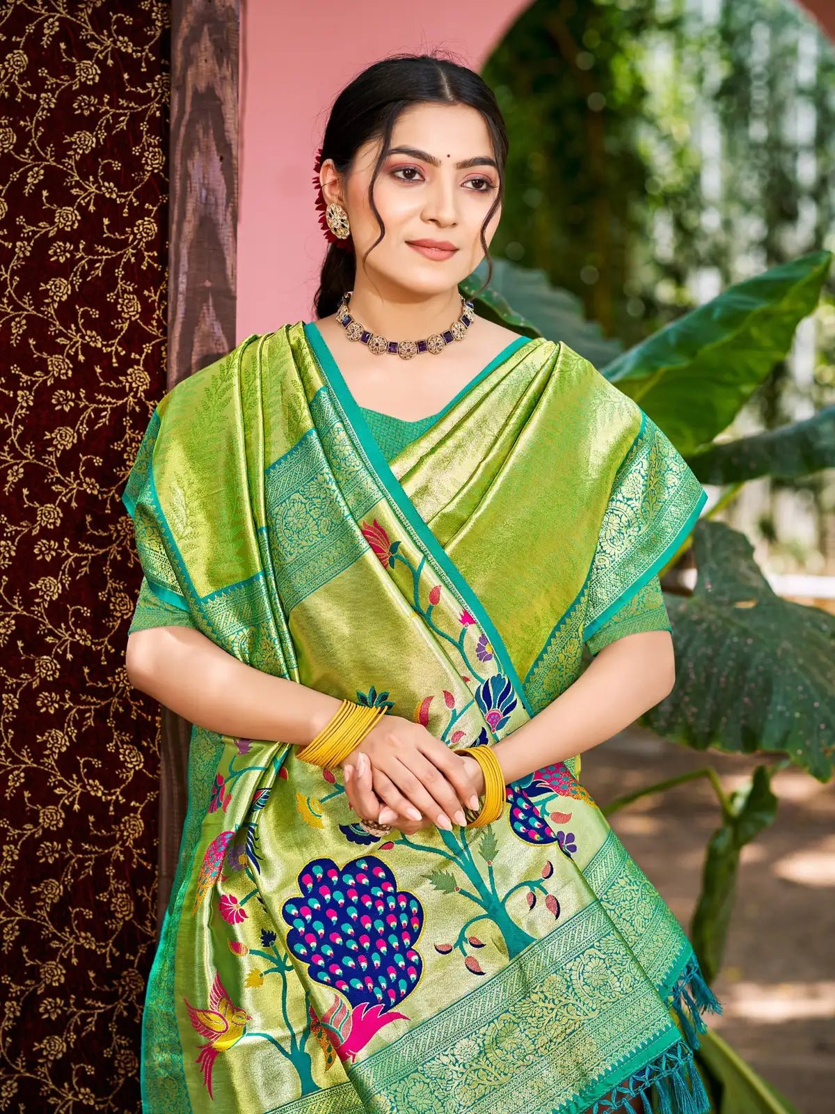 Tarani premium green Kanjivaram silk saree upper body view with blouse