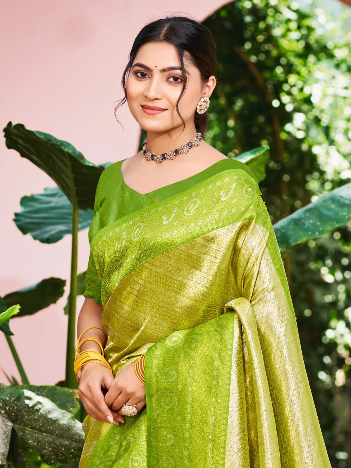 Tarani premium green Kanjivaram silk saree upper body view with blouse and jewelry styling