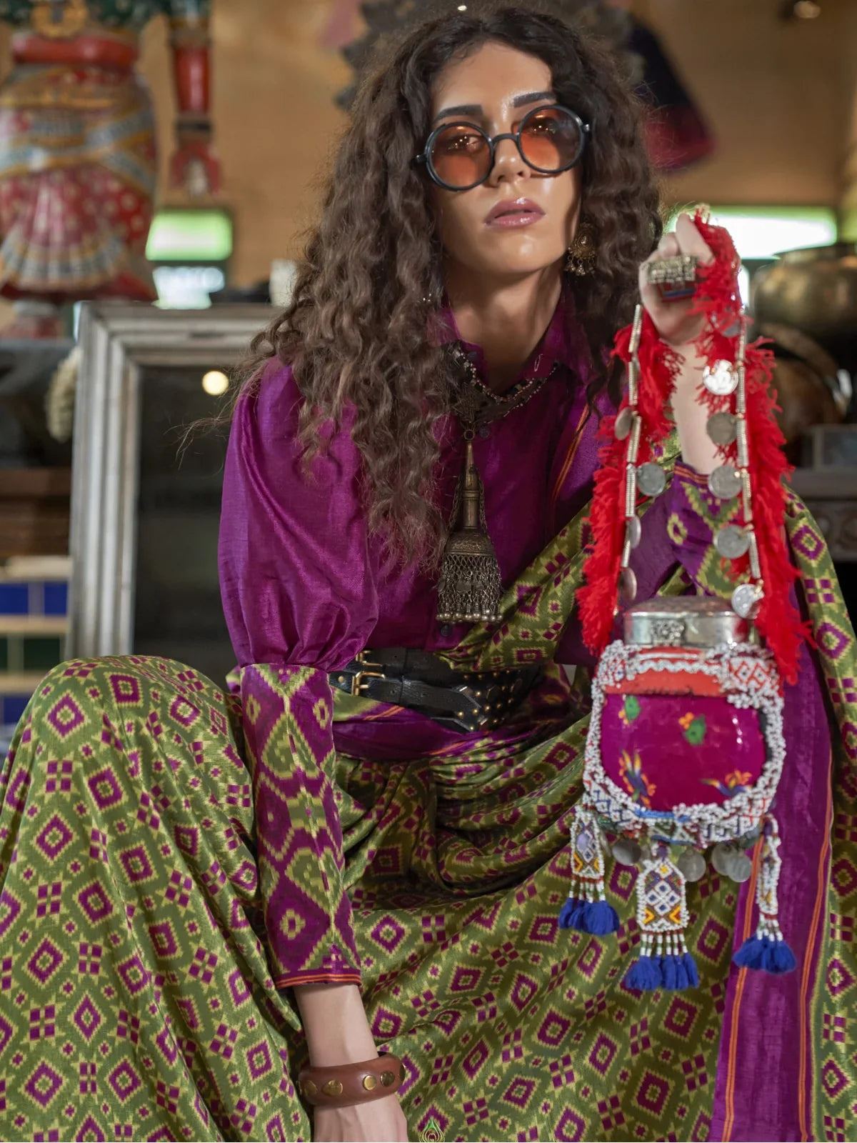 Tarani green silk saree upper body styling with purple blouse and oxidised jewellery for party look
