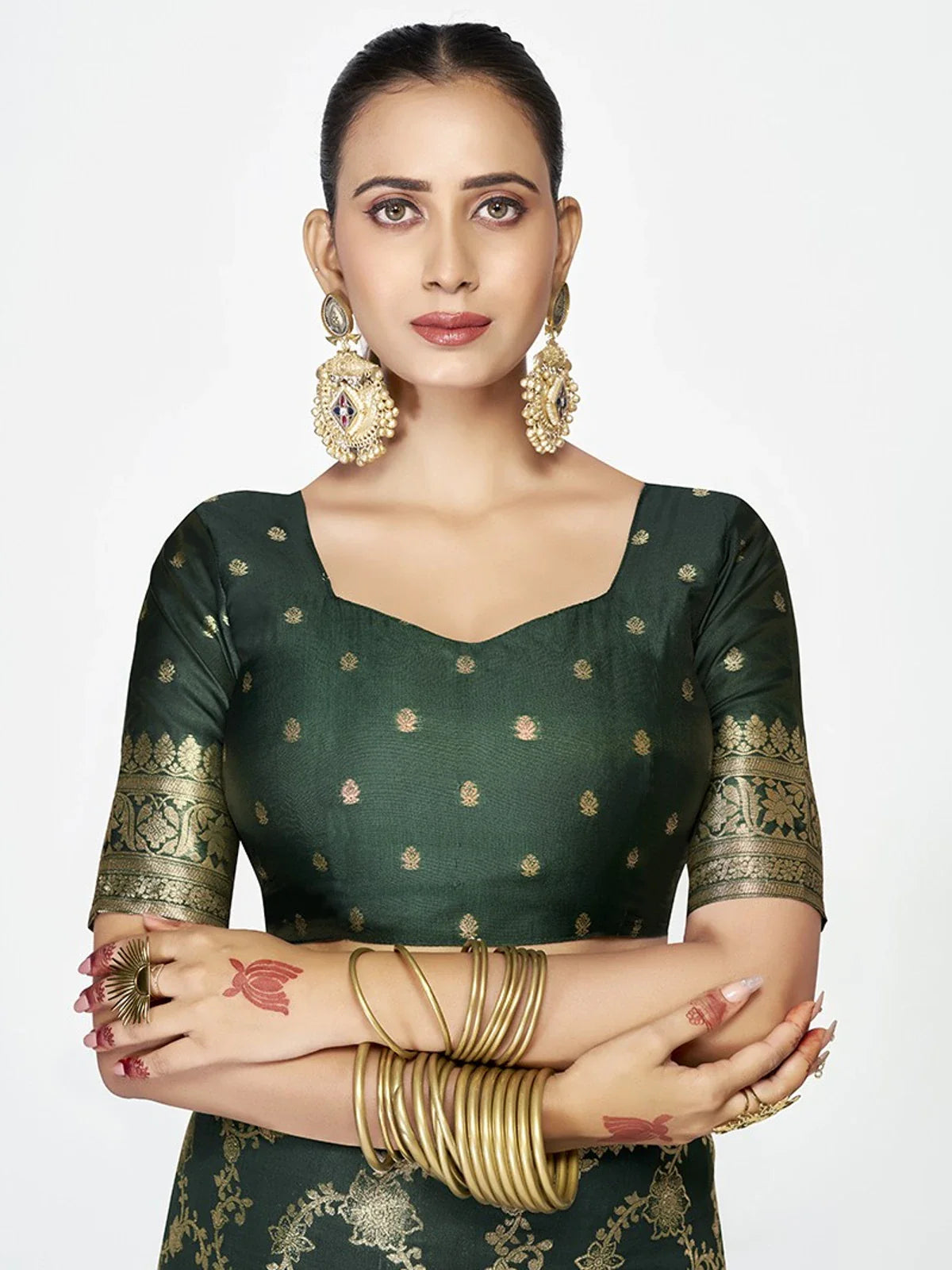 Tarani green silk blouse front design with woven detailing and classic neckline