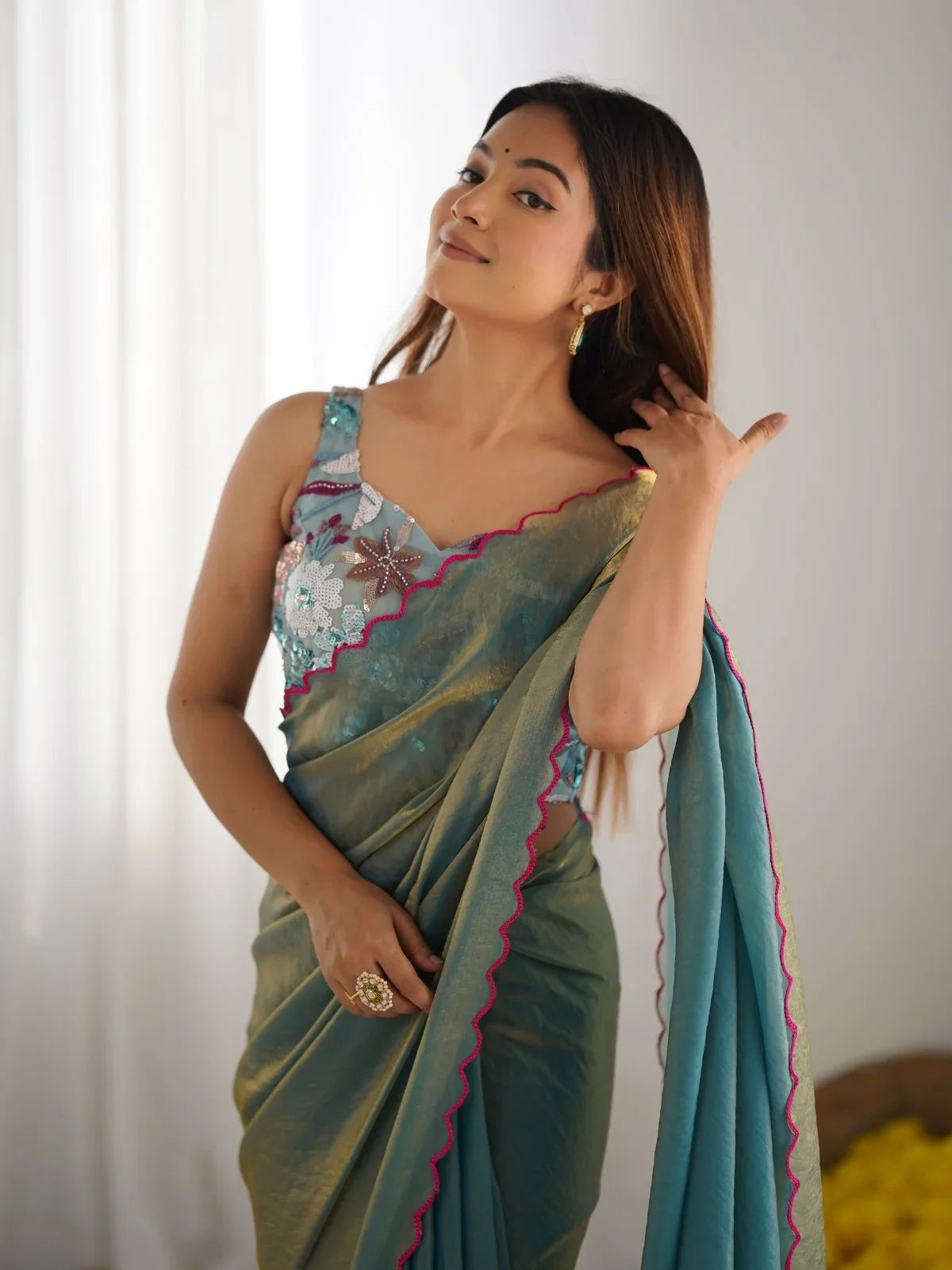 Tarani green silk saree upper-body view showing designer floral beaded blouse