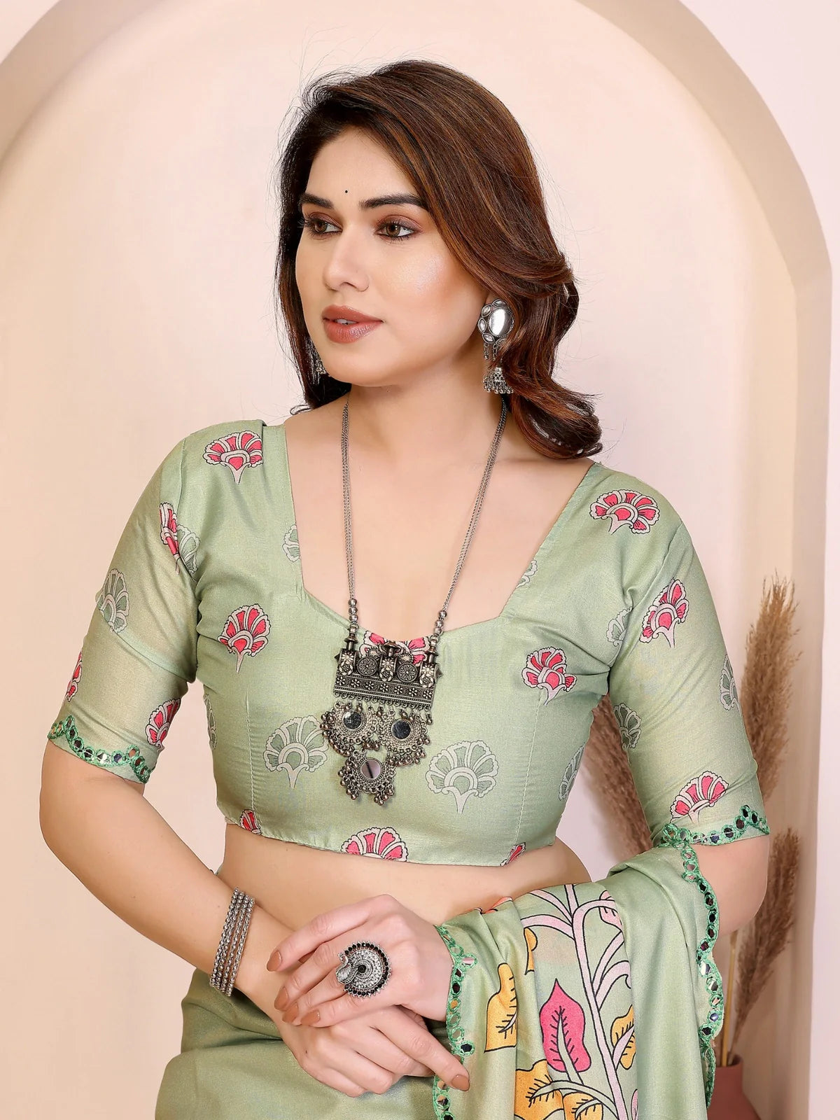 Tarani Manipuri silk saree with blouse closeup showing embroidery and mirror detailing