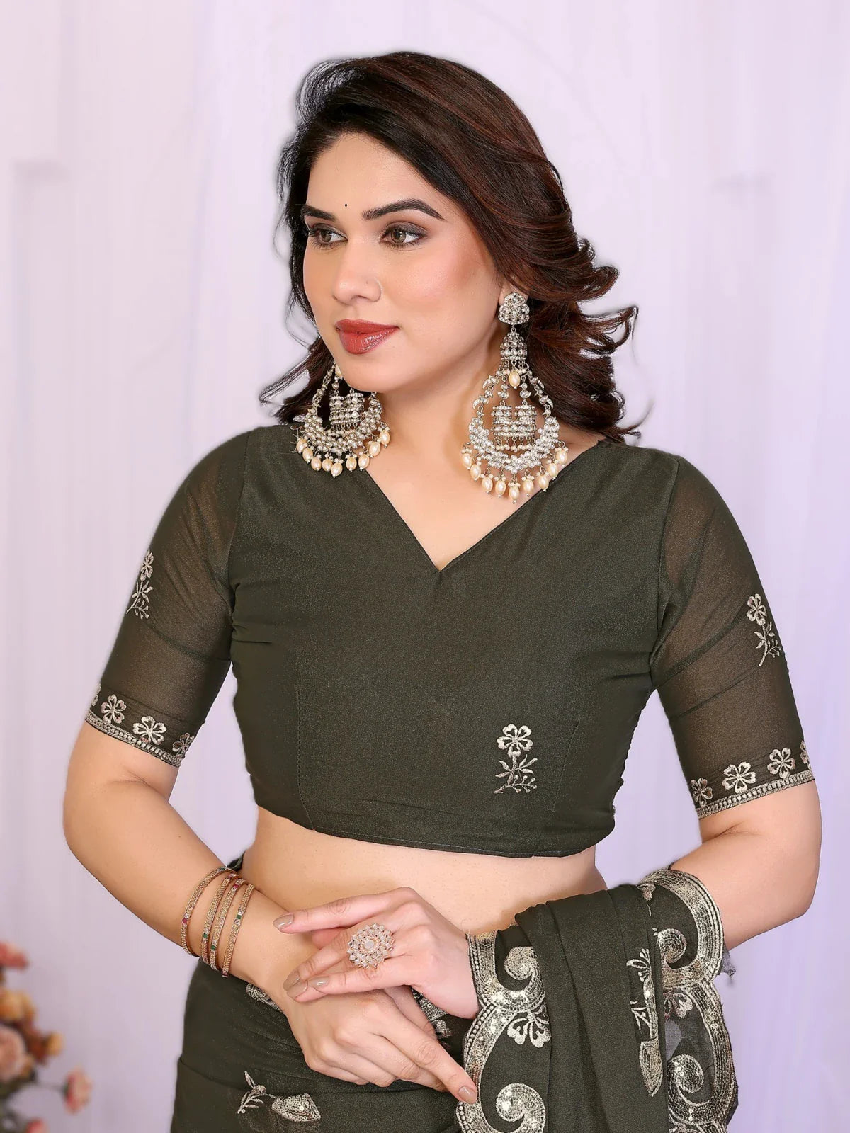 Tarani elegant green saree with detailed blouse design and embroidery upper body view