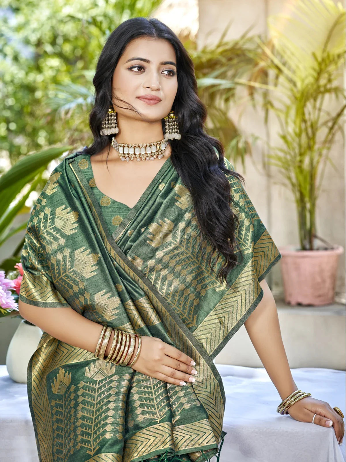Tarani green Assam silk saree upper body view showcasing elegant zari weave and blouse design