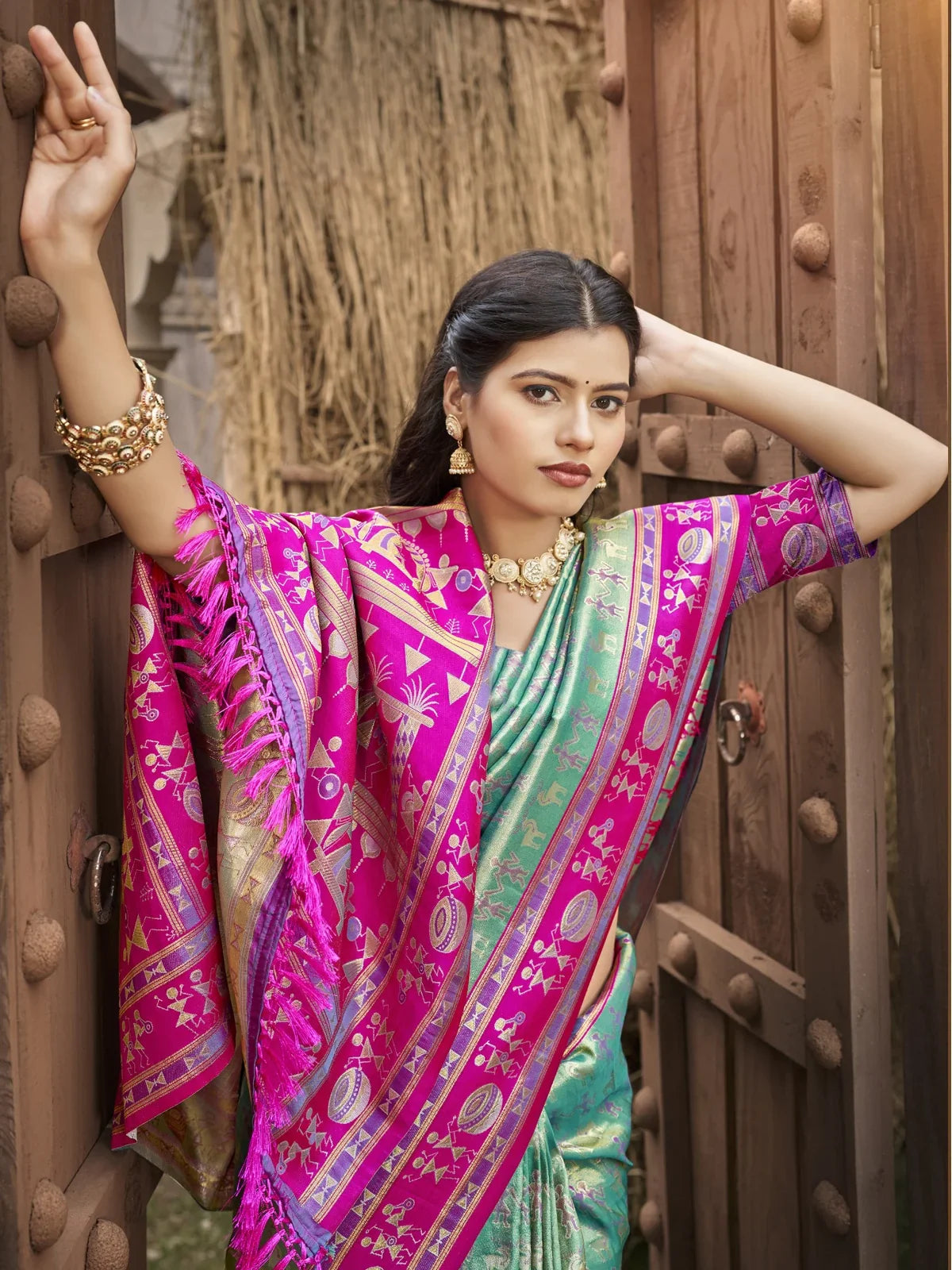 Tarani elegant green kanjivaram silk saree upper body view with traditional jewellery