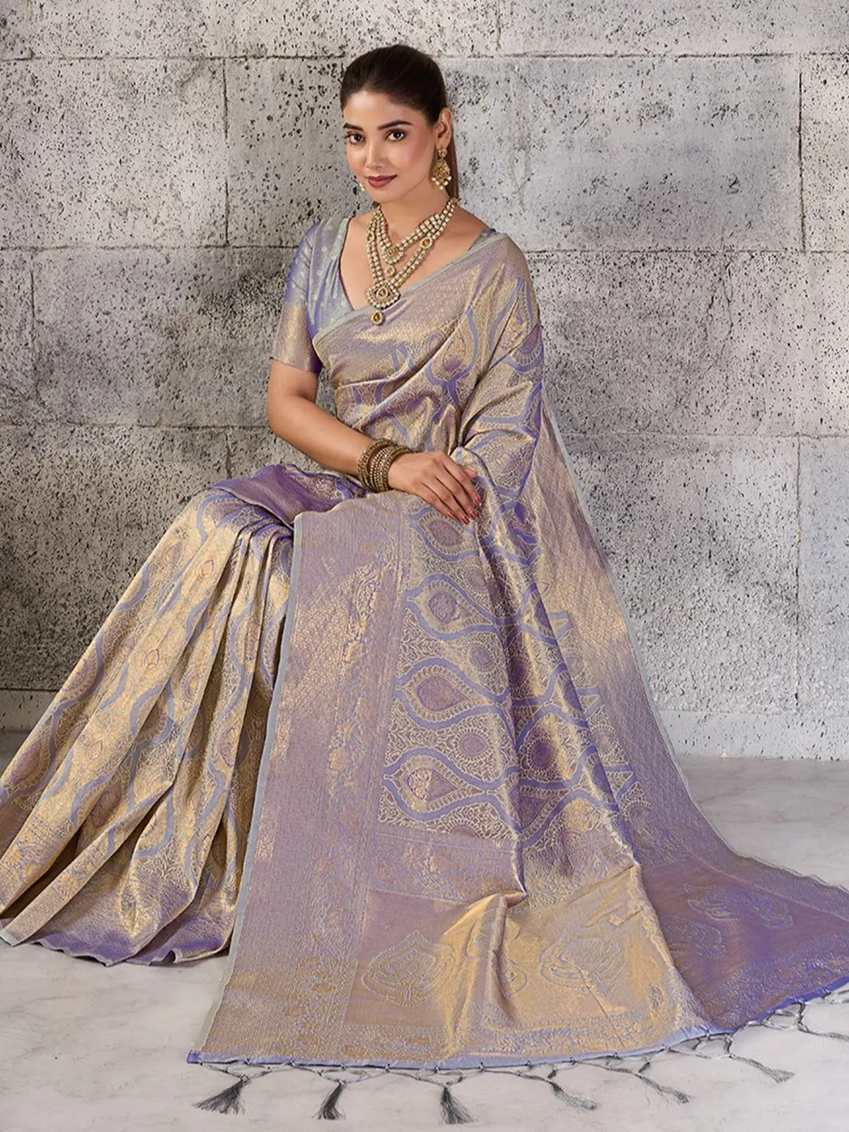 Tarani lavender Kanjivaram Silk Blend saree seated full view with graceful drape and zari work
