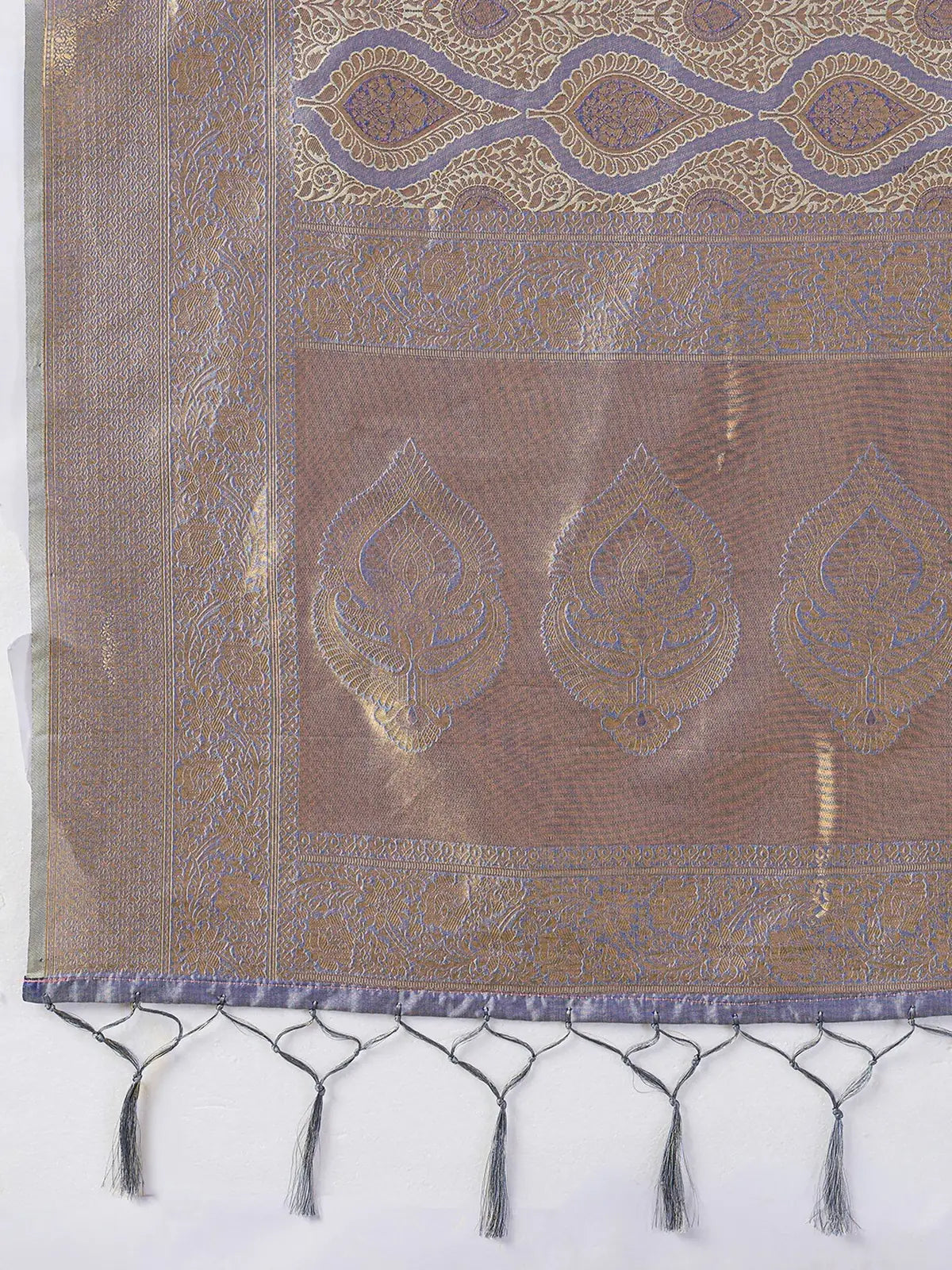 Tarani lavender Kanjivaram Silk Blend saree pallu closeup with intricate zari motifs and tassels