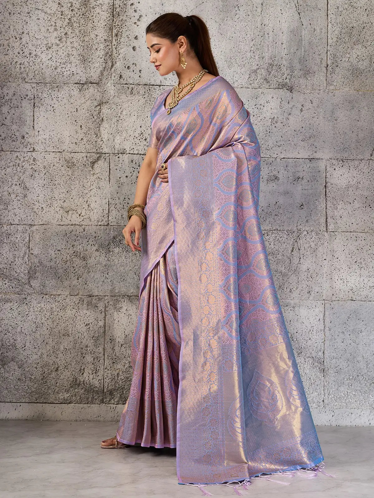 Tarani Suhani lavender Kanjivaram silk blend saree side view showcasing elegant drape and zari motifs