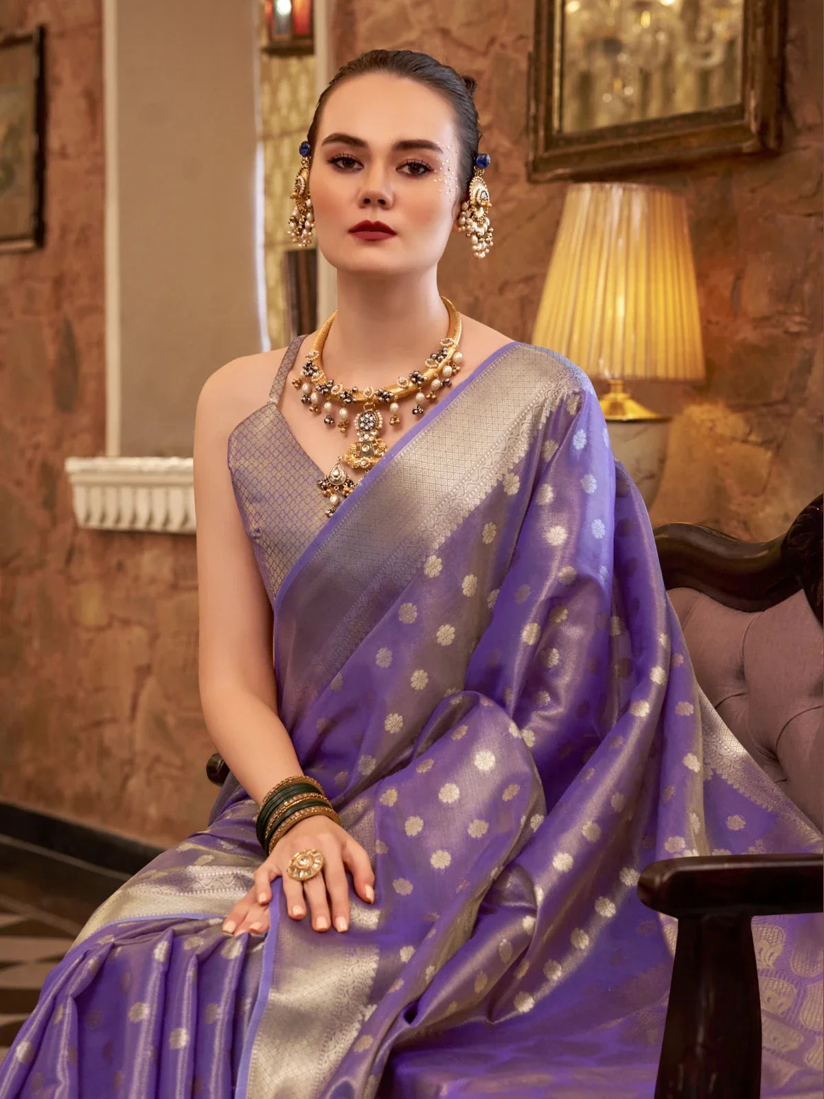 Tarani lavender zari tissue silk saree upper body view showing blouse and rich border