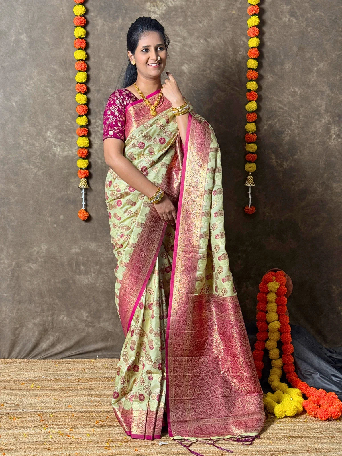 Tarani green woven silk saree full view with maroon pallu for festive wear