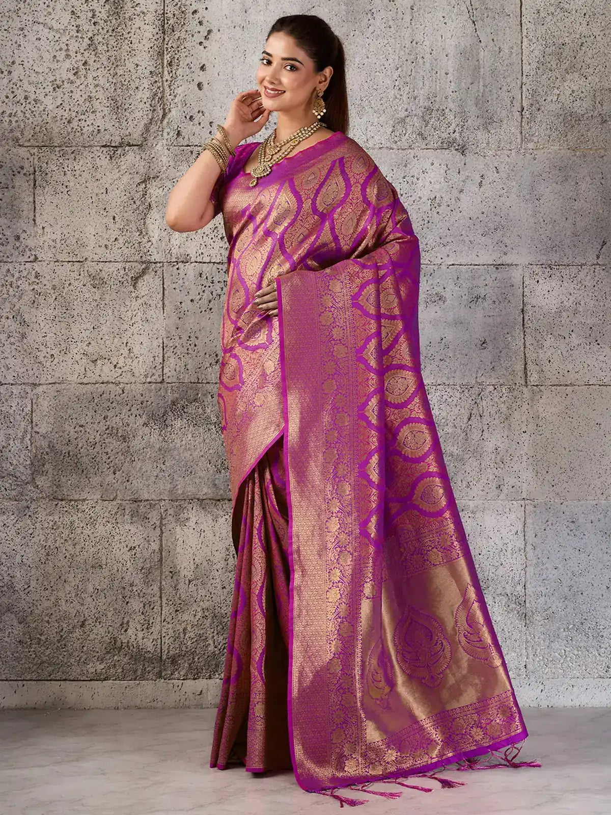 Tarani magenta Kanjivaram silk blend saree front pose with intricate gold zari motifs