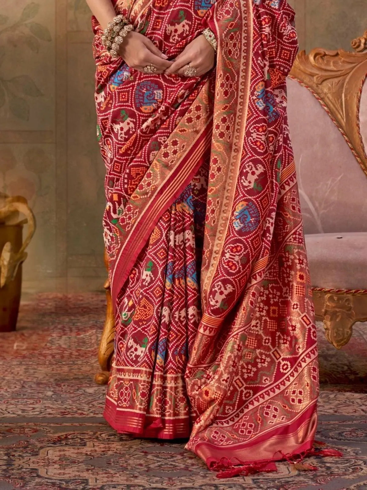 Tarani maroon Patola silk saree with jari work pallu view
