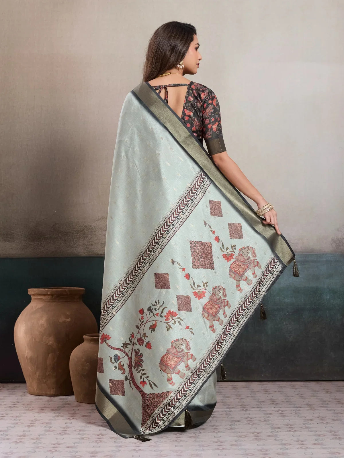 Tarani mint green digital print saree in full back view with drape fall
