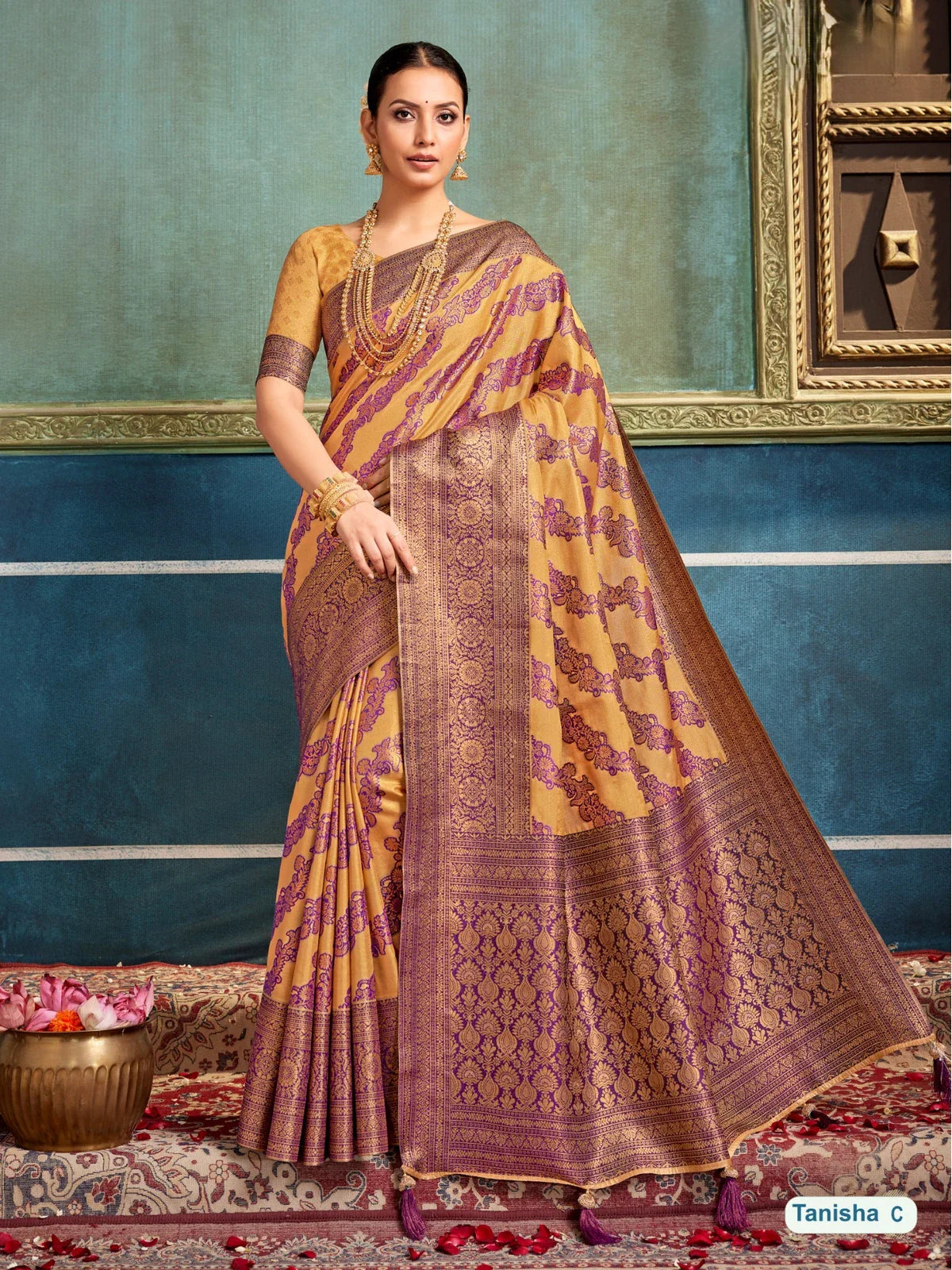Tarani mustard silk saree with violet designer weaving and contrast border perfect for festive occasions