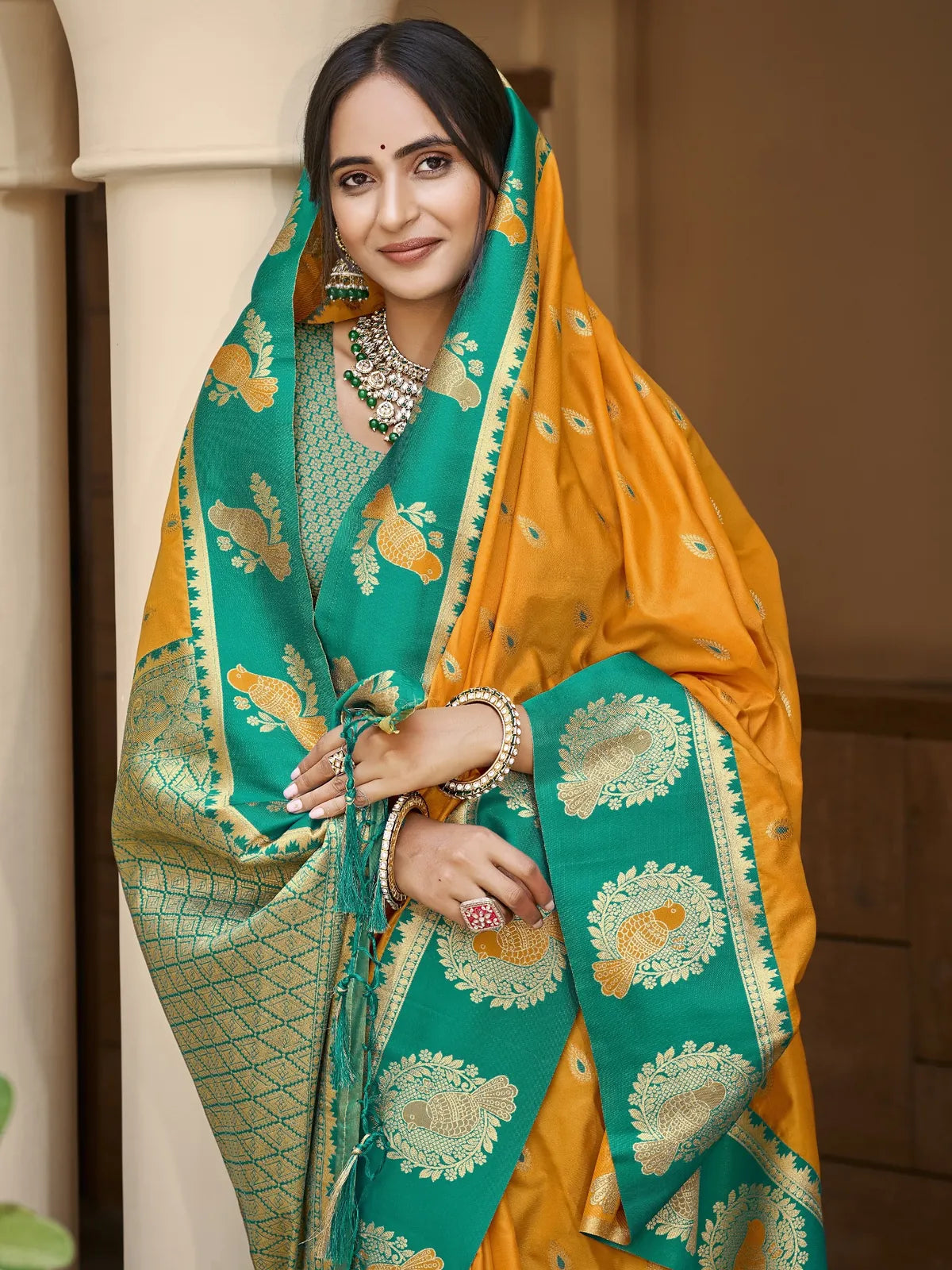 Tarani mustard silk saree upper body view with woven blouse and zari pallu detailing