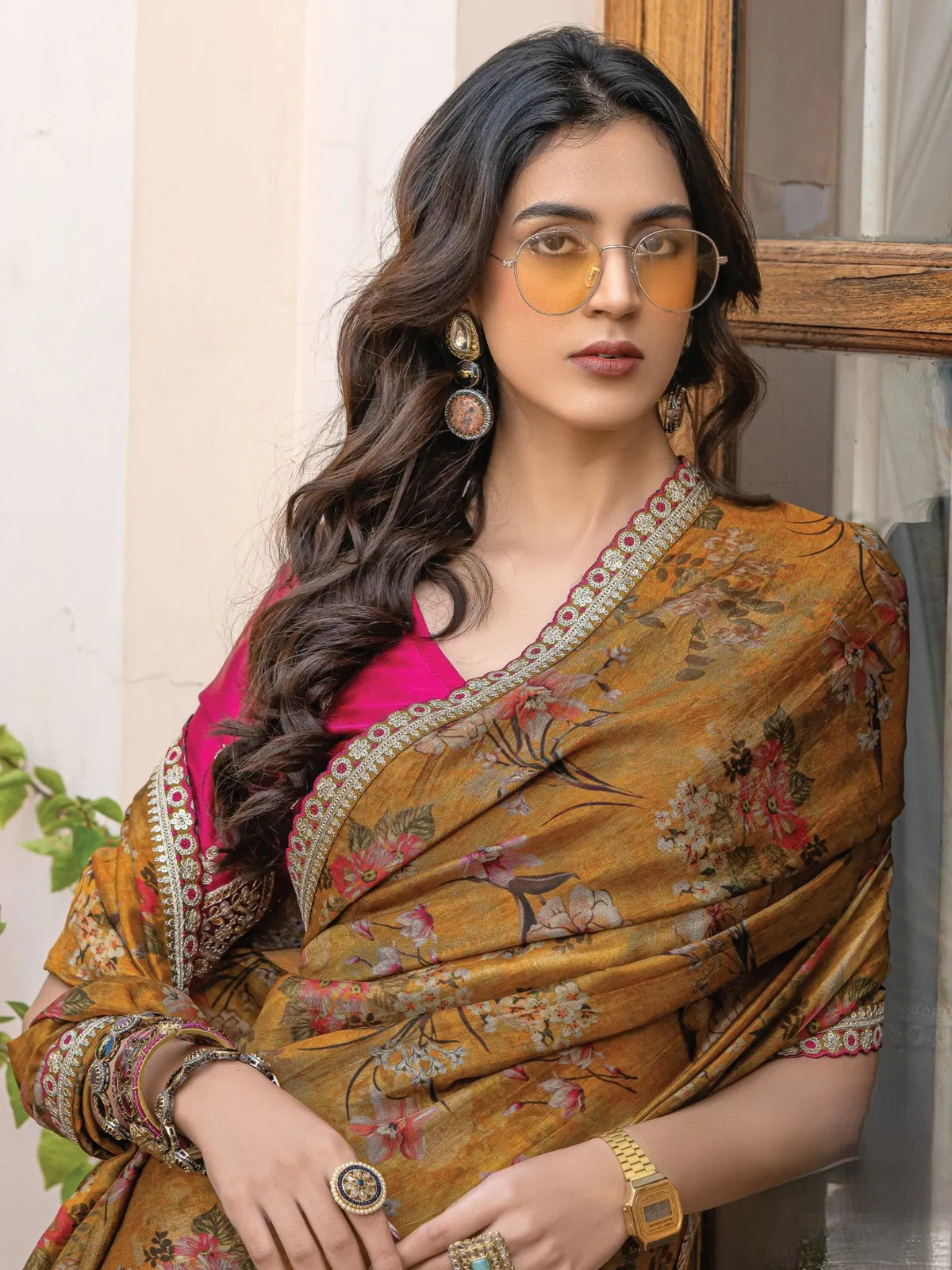 Tarani Ankura mustard floral saree upper body with contrast pink blouse and embroidered border