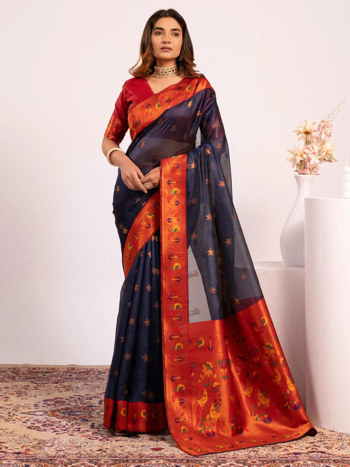 Tarani premium navy blue soft tissue silk Paithani saree full view with zari woven border and blouse