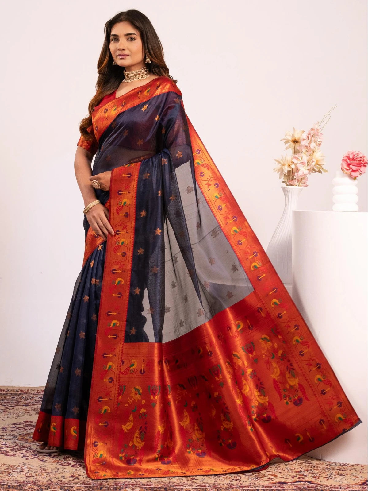 Tarani navy blue soft tissue silk Paithani saree pallu view with rich zari woven design