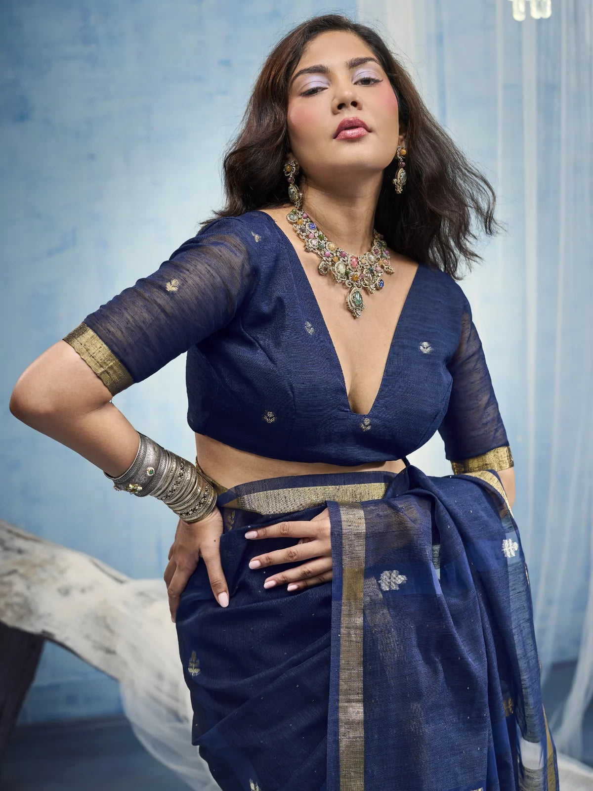 Tarani navy blue Munga Silk saree upper body blouse view with woven border