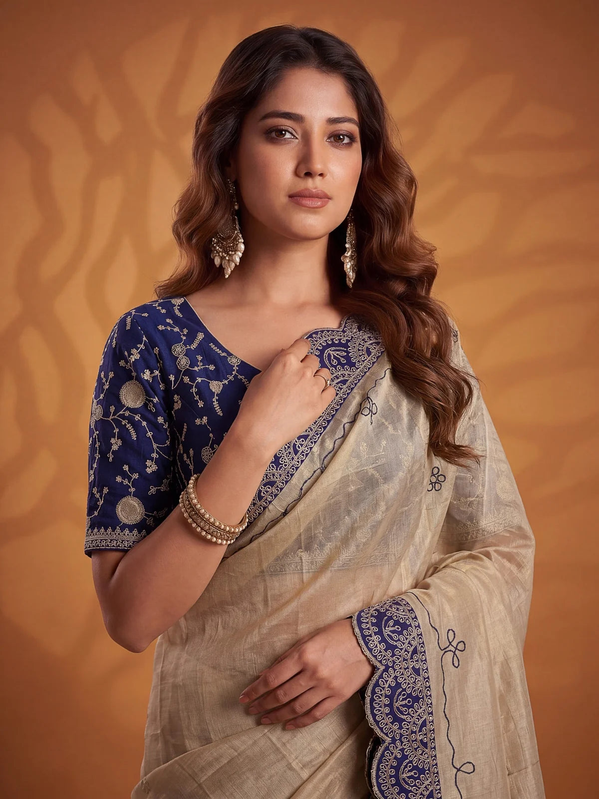 Tarani navy blue Erodee Silk saree upper body view with embroidered blouse and scallop border