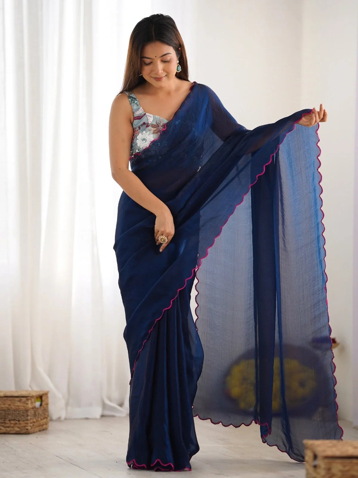 Tarani navy blue space silk saree full view with scallop pink border and sleeveless designer blouse
