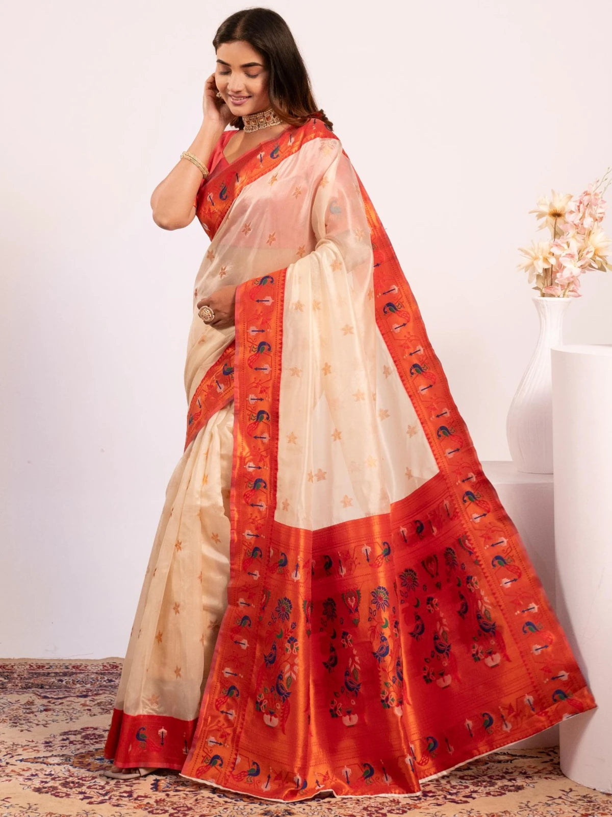 Tarani off white Paithani saree side view showing rich pallu