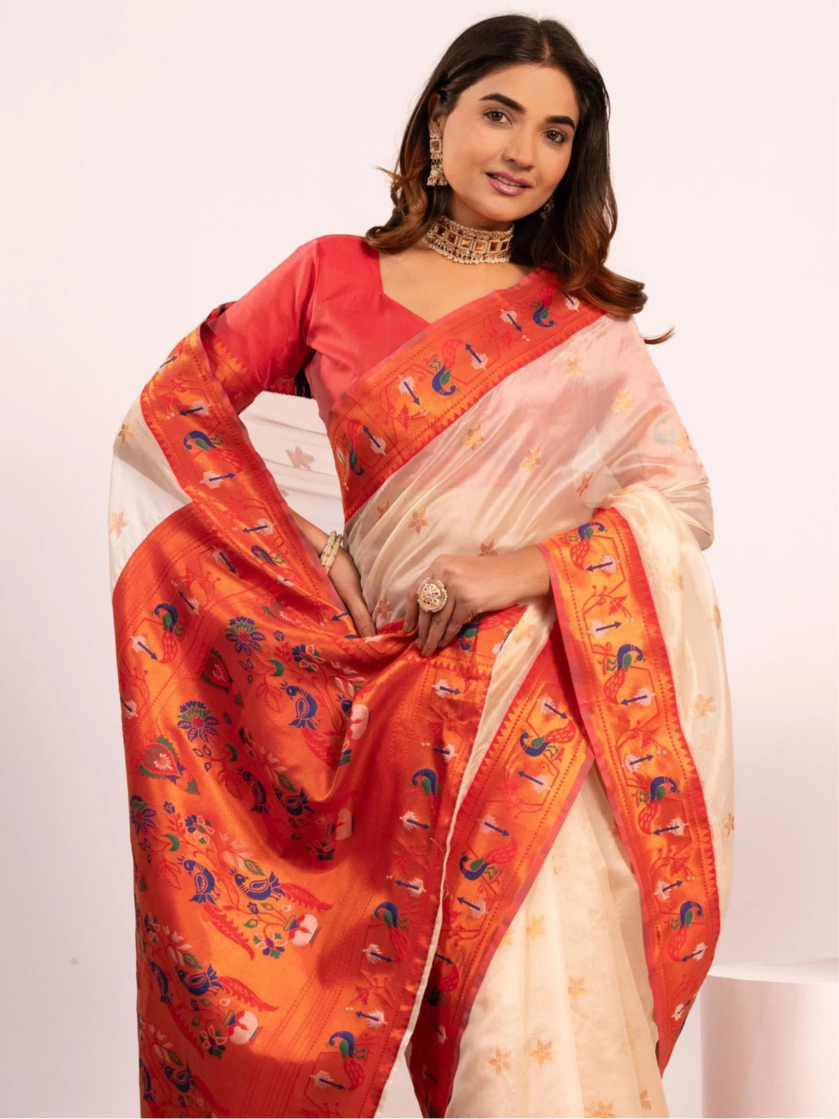 Tarani Premium Soft Tissue Silk off white Paithani saree upper body view highlighting border