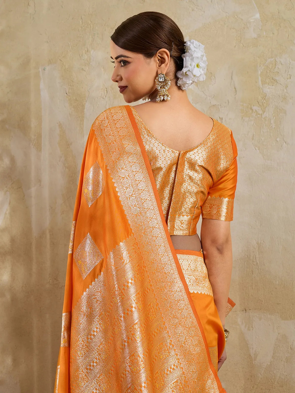 Tarani orange silk blend zari work saree blouse back design closeup