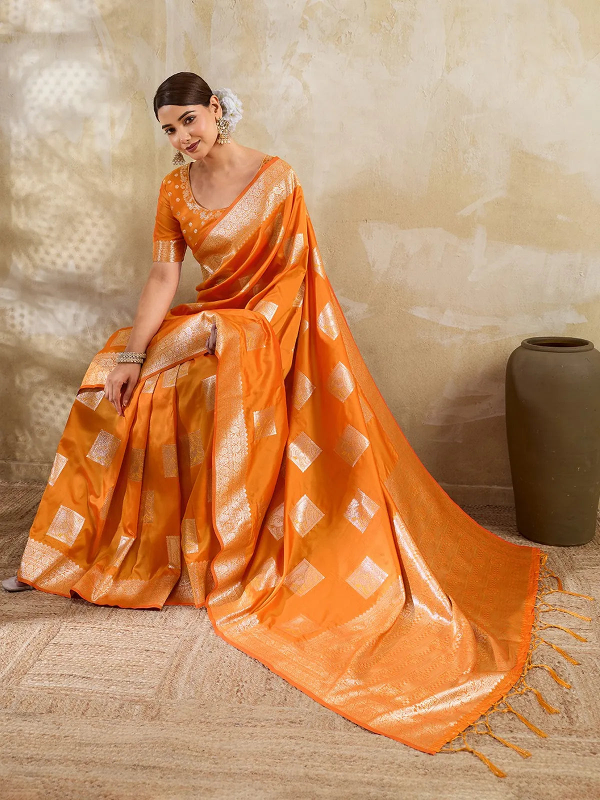 Tarani orange silk blend zari work saree front pose with rich zari border