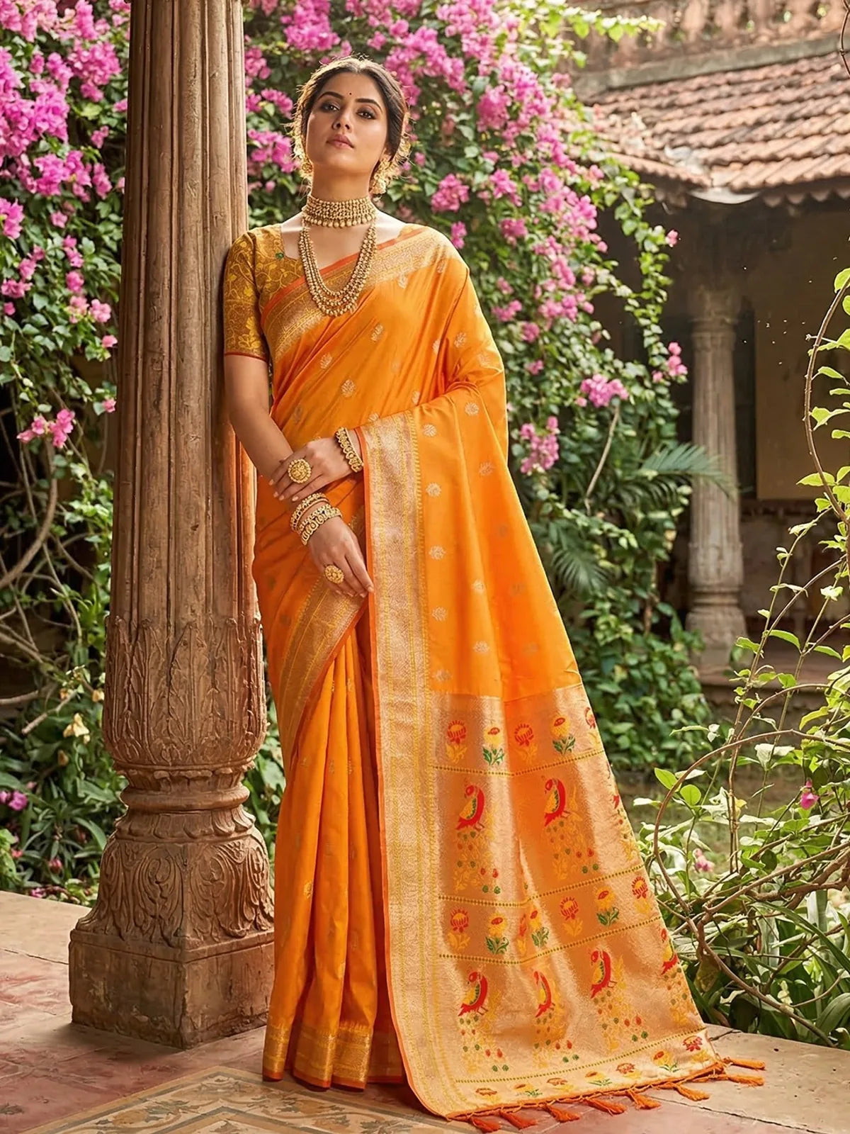 Tarani Minal orange soft silk saree with zari border and pallu full front view