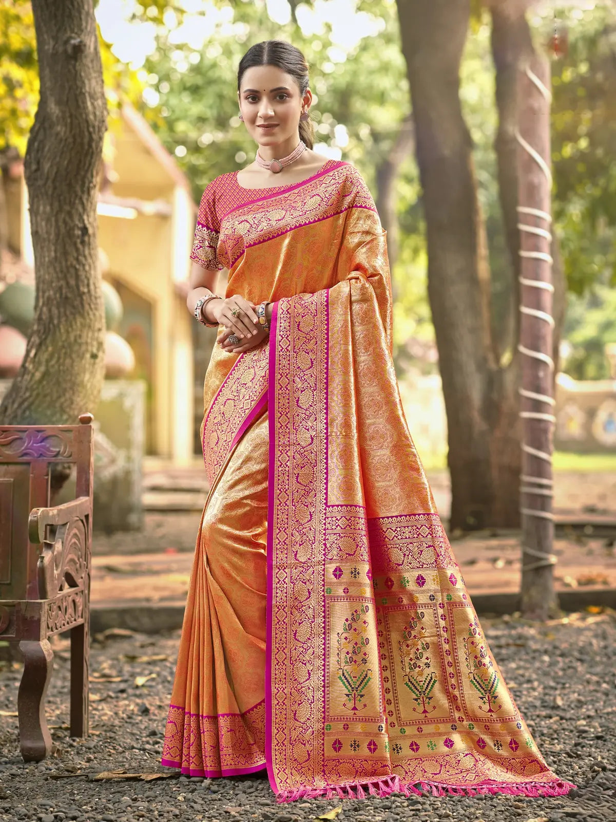 Tarani orange Kanjivaram silk saree with pink border full view
