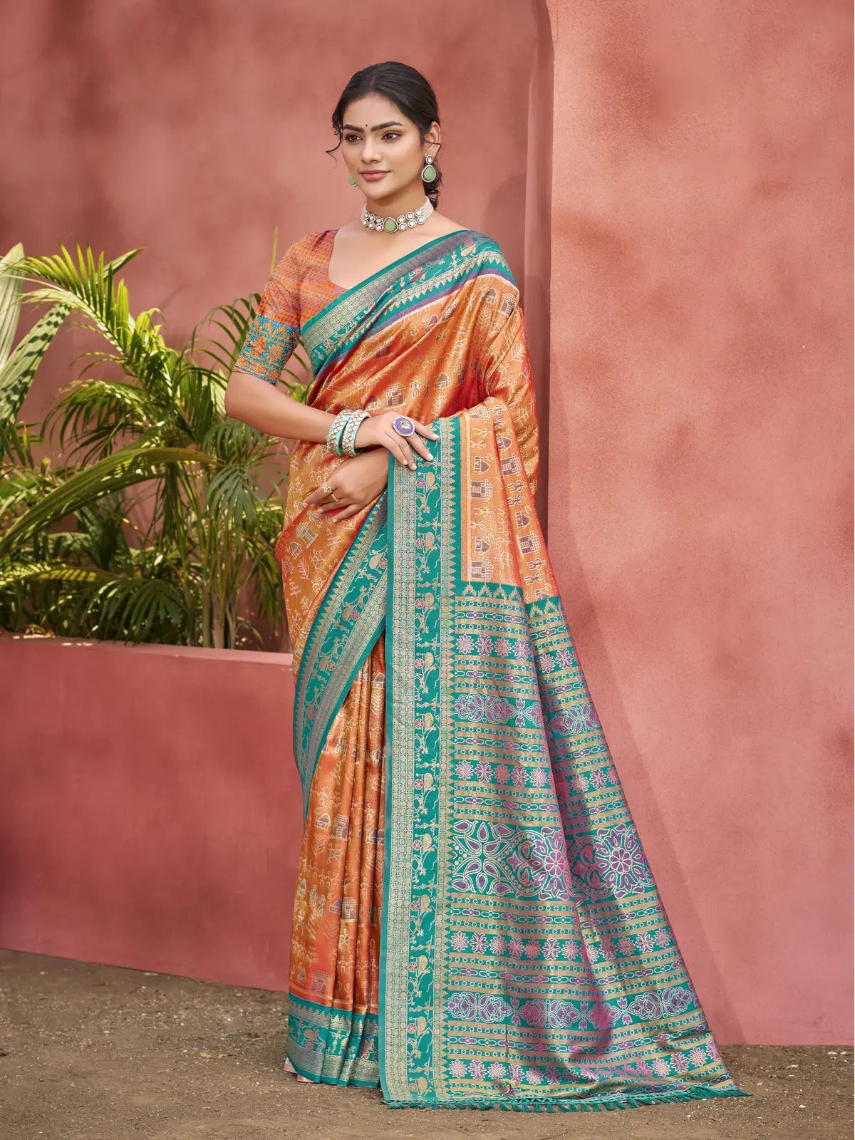 Tarani orange kanjivaram silk saree with teal border full view