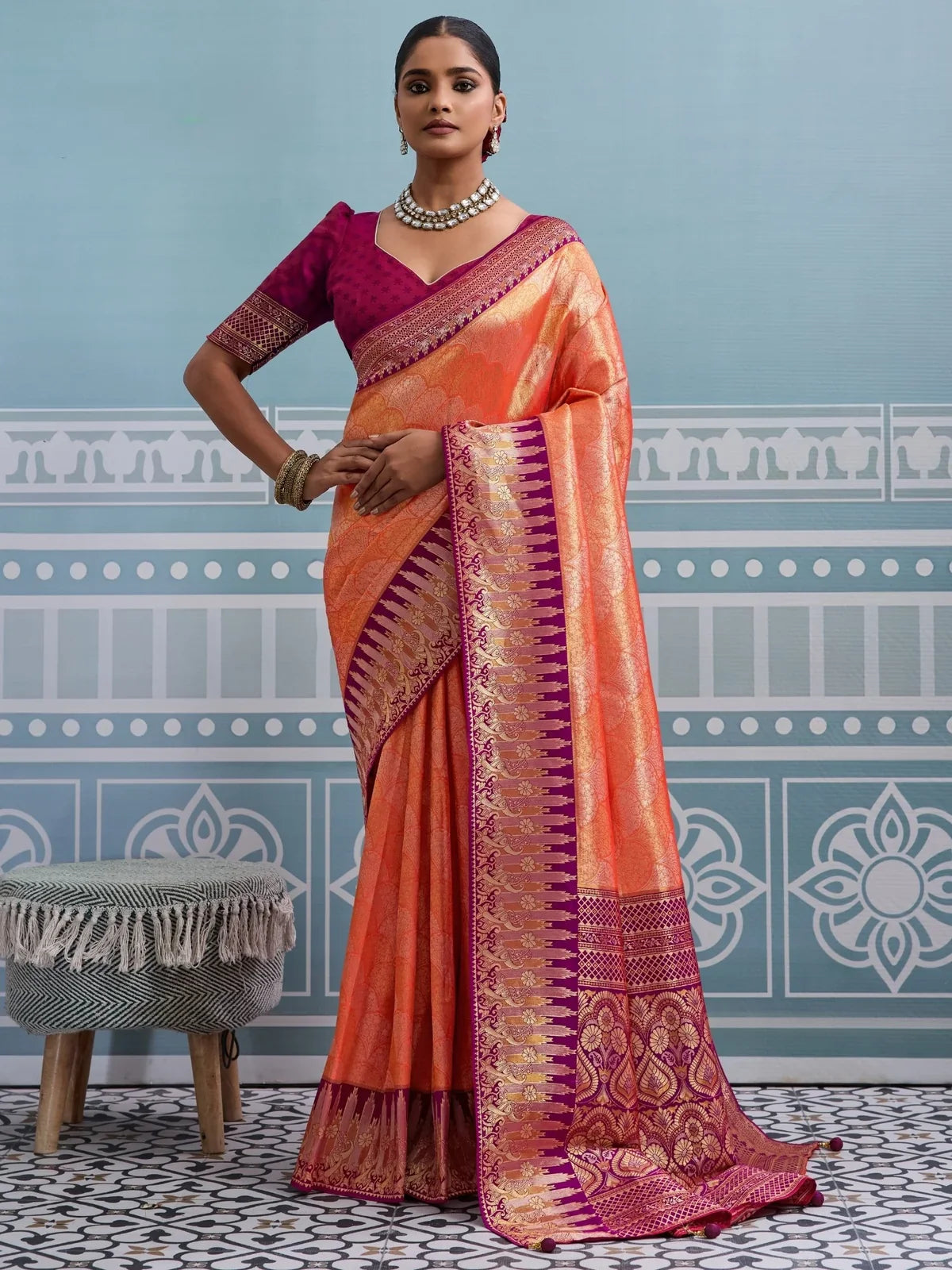 Tarani orange silk saree full view with zari weaving and rich pallu