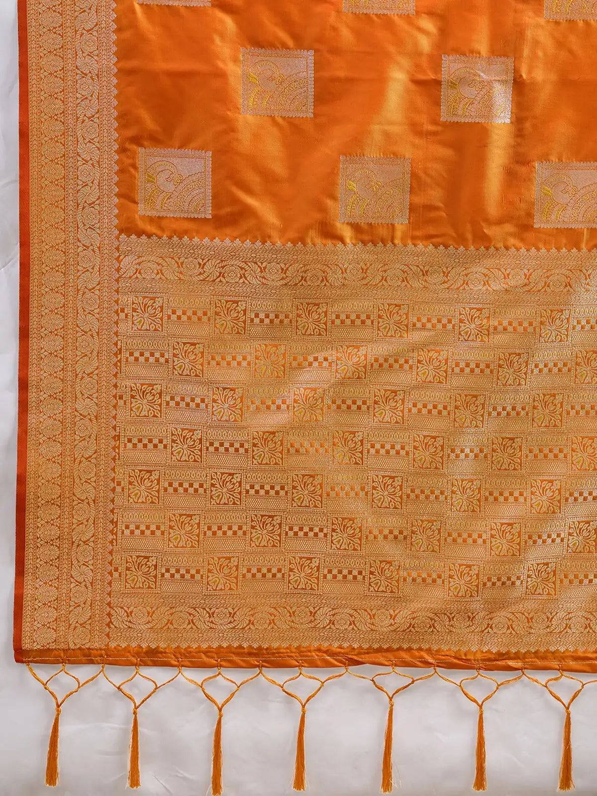 Tarani orange silk blend zari work saree pallu and zari border closeup
