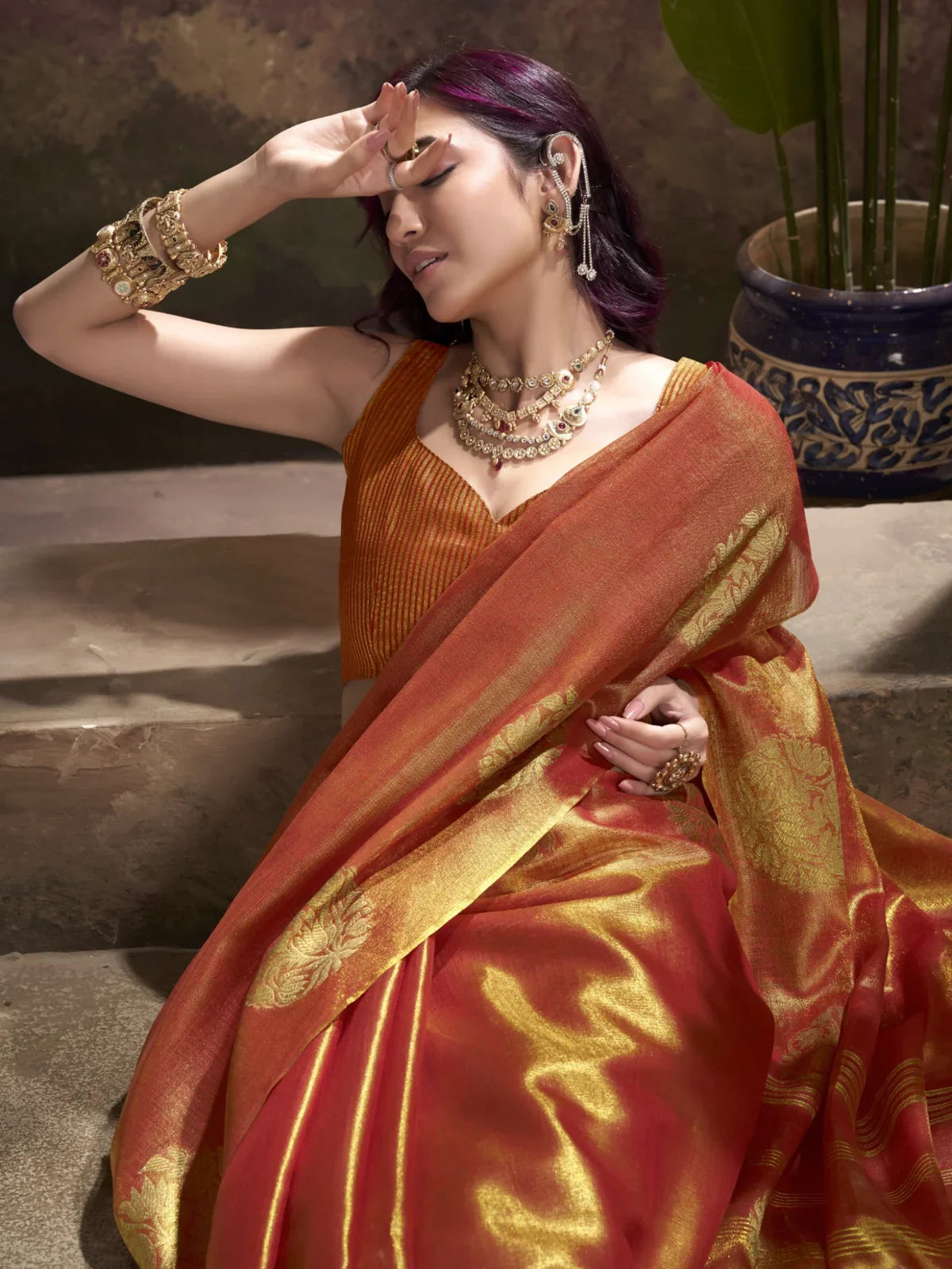 Tarani orange tissue silk saree close upper body view with elegant blouse style