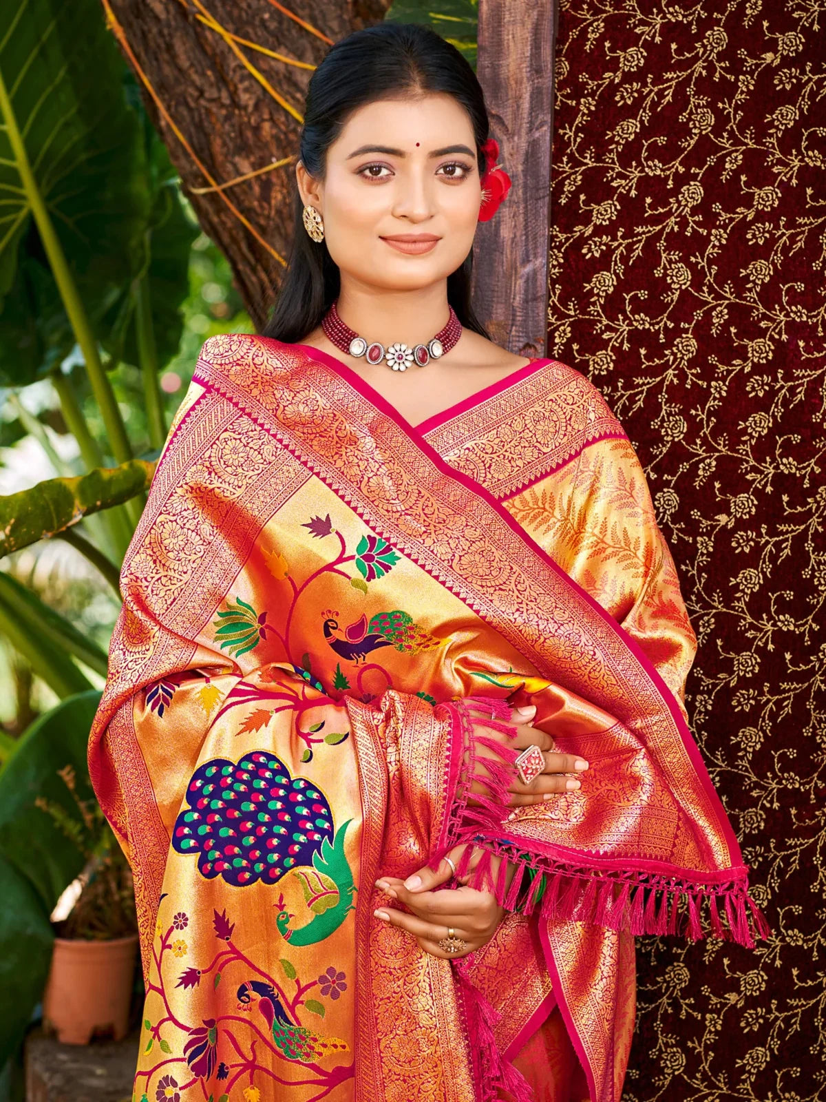 Tarani orange Kanjivaram silk saree upper body view showing blouse and border details