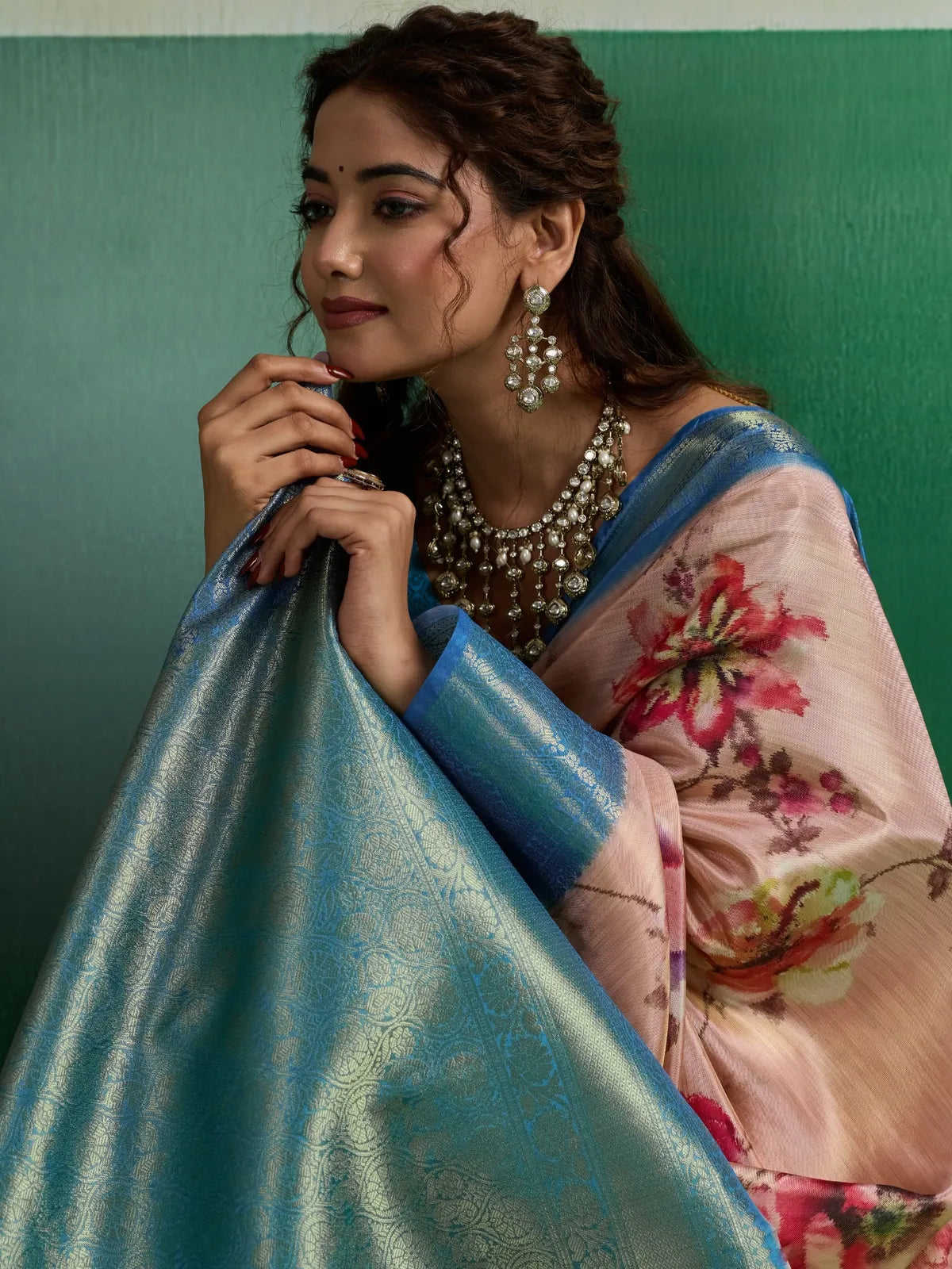 Tarani Pure Kanjivaram Tissue Silk peach floral saree closeup showing floral print and border