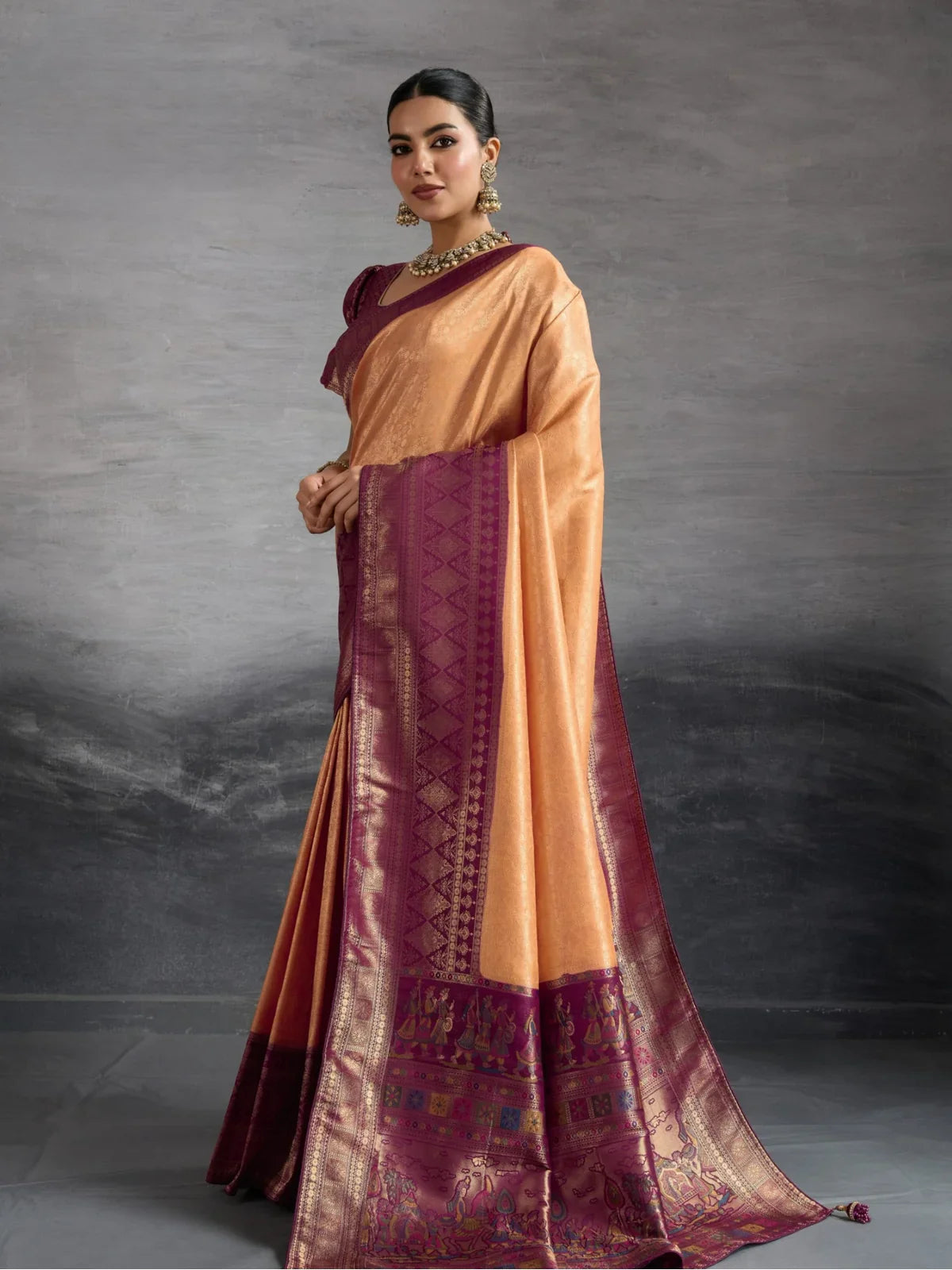 Tarani peach Kanjivaram silk saree front view showing zari pallu and blouse