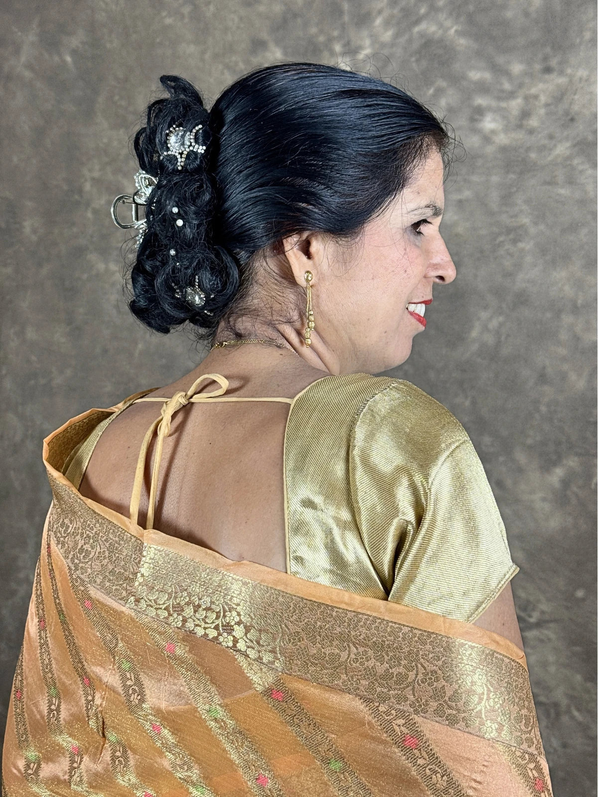 Tarani golden silk saree blouse view showcasing elegant back blouse style