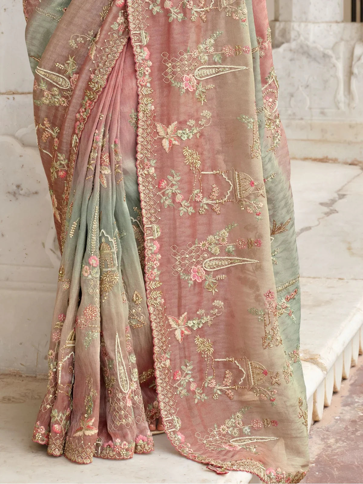 Tarani peach silk saree close-up highlighting embroidery, pallu and border design