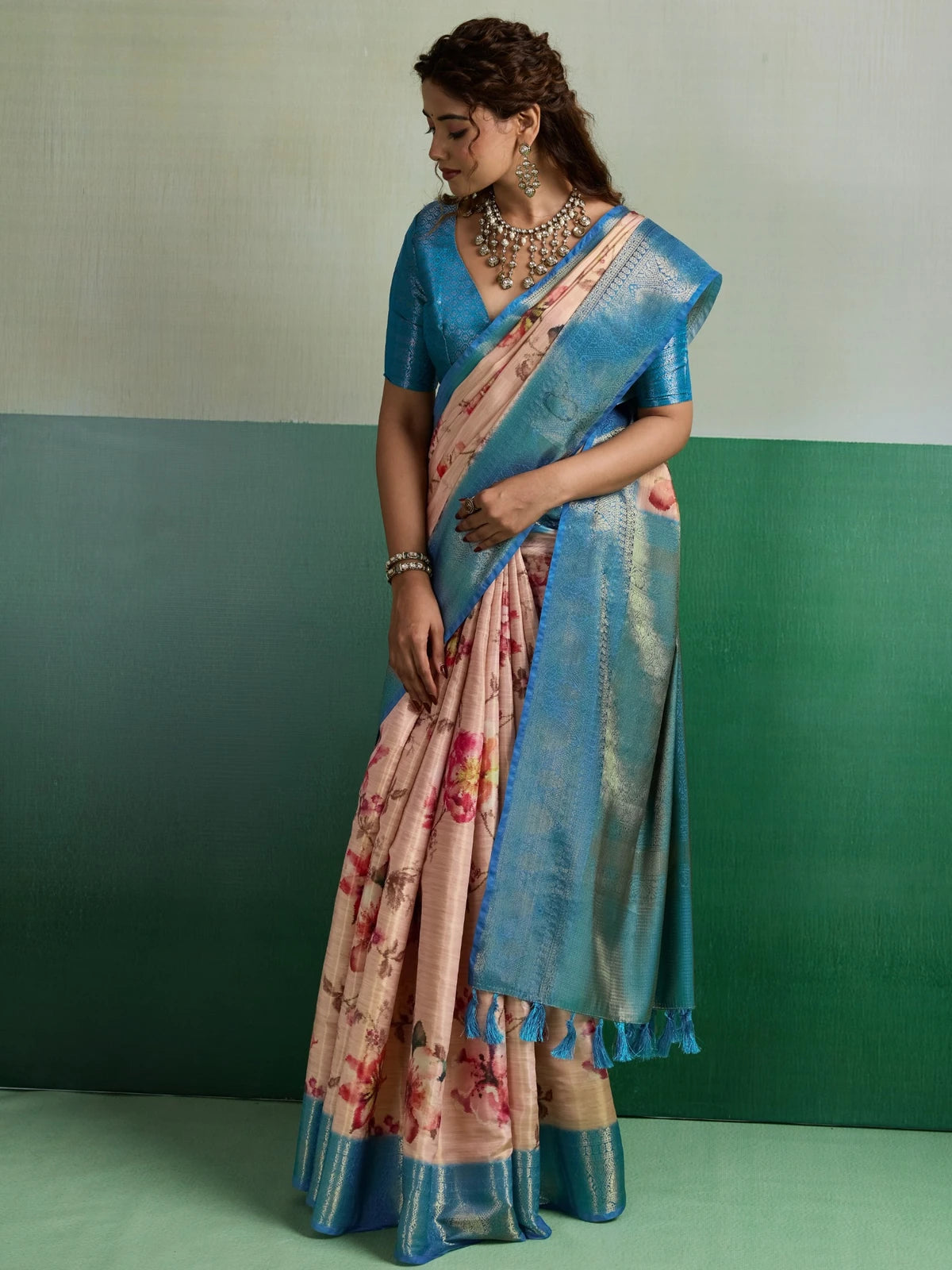 Tarani Pure Kanjivaram Tissue Silk peach floral saree side view showing elegant drape